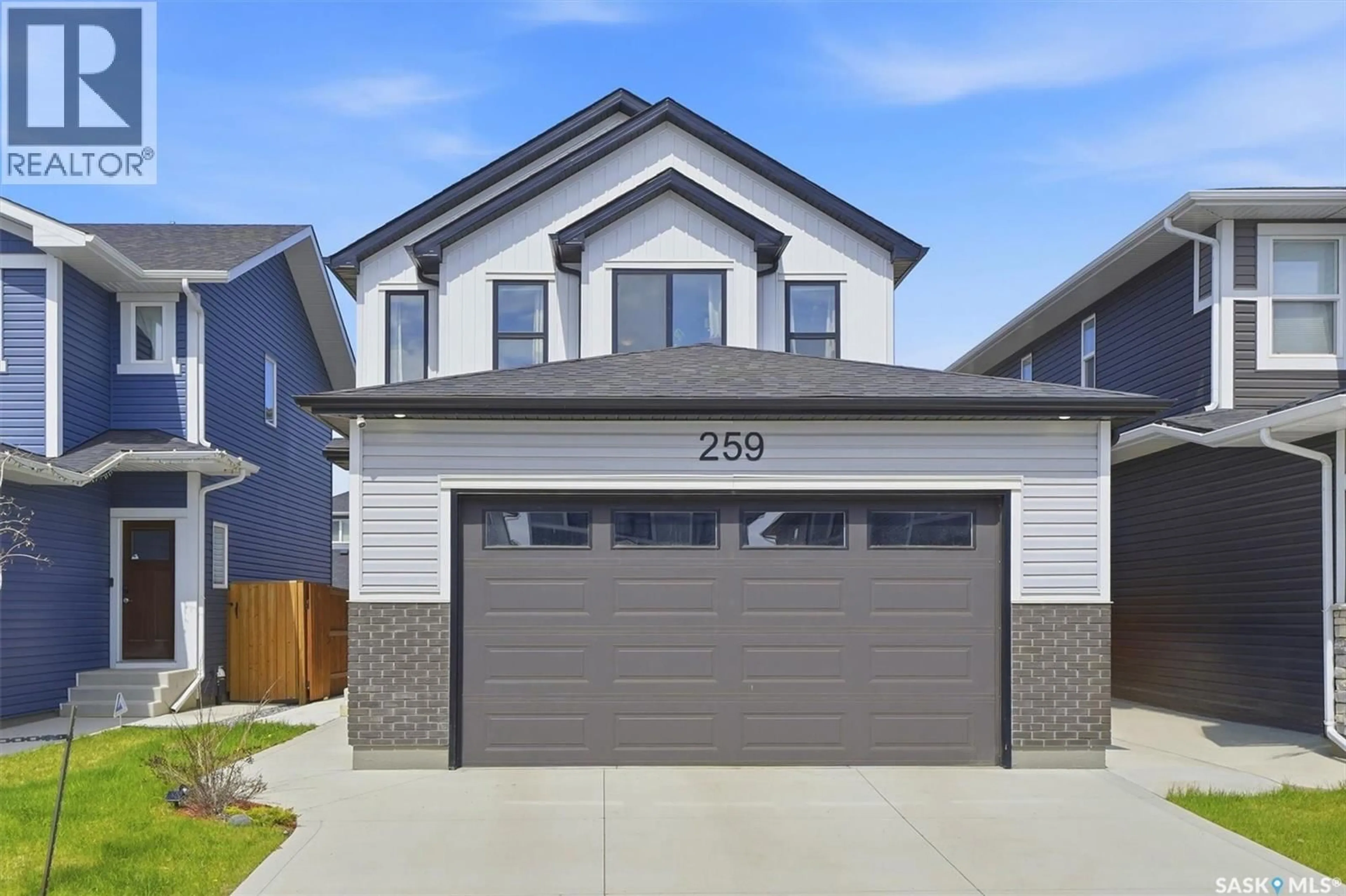 Home with vinyl exterior material, street for 259 SKOPIK CRESCENT, Saskatoon Saskatchewan S7V0N4