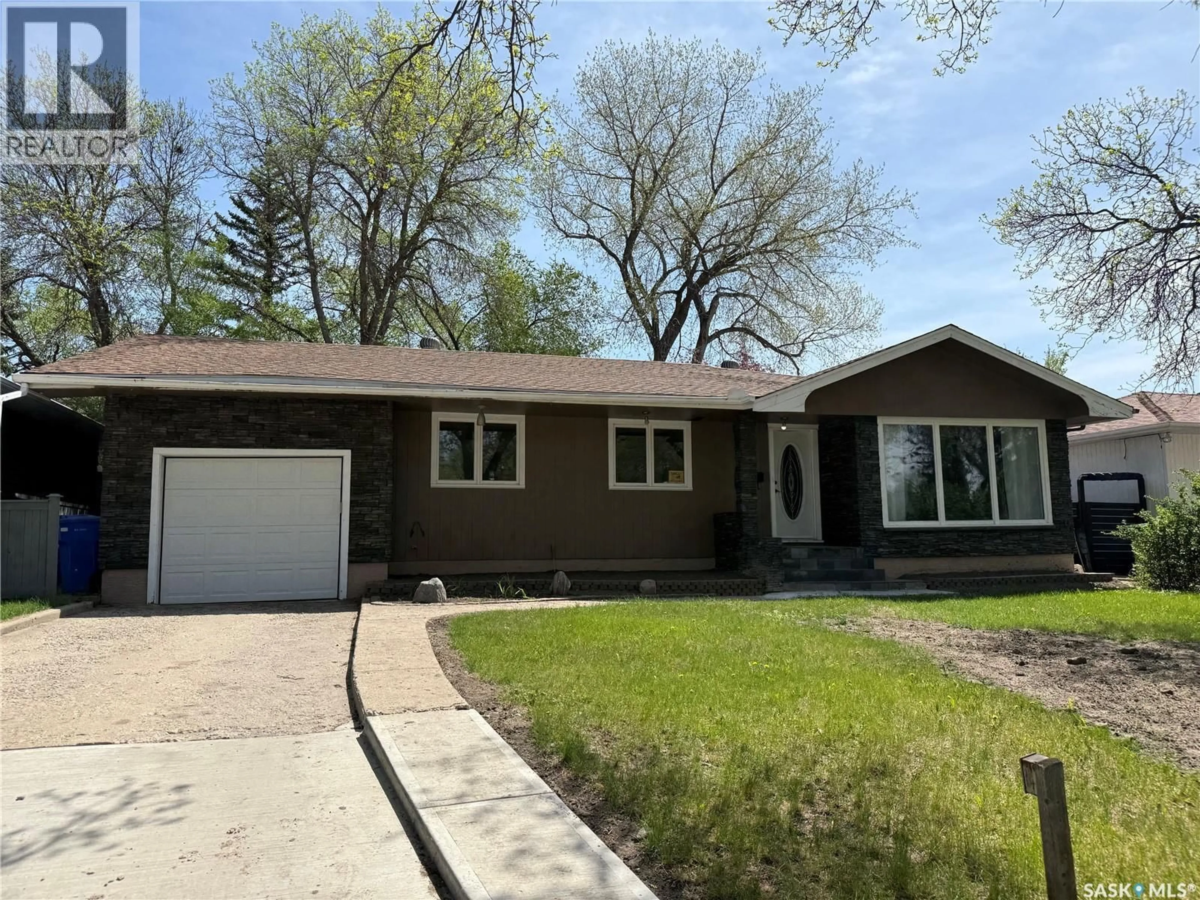Home with vinyl exterior material, street for 25 CALDER CRESCENT, Regina Saskatchewan S4S4A5