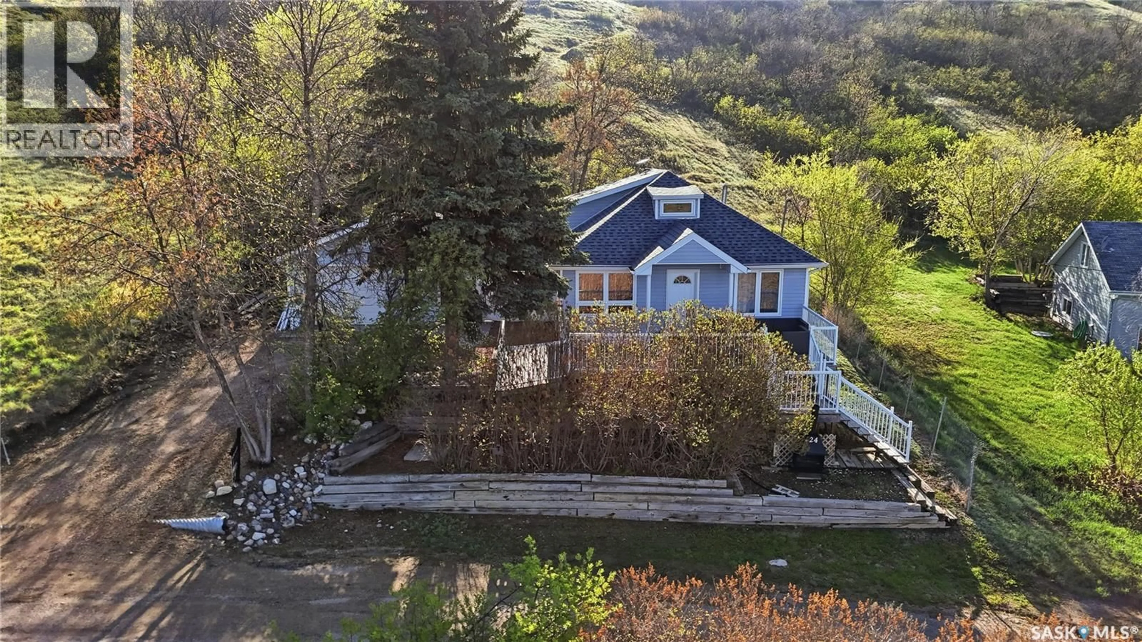 A pic from outside/outdoor area/front of a property/back of a property/a pic from drone, water/lake/river/ocean view for 24 ALICE CRESCENT, Marquis Rm No. 191 Saskatchewan S0H4C0