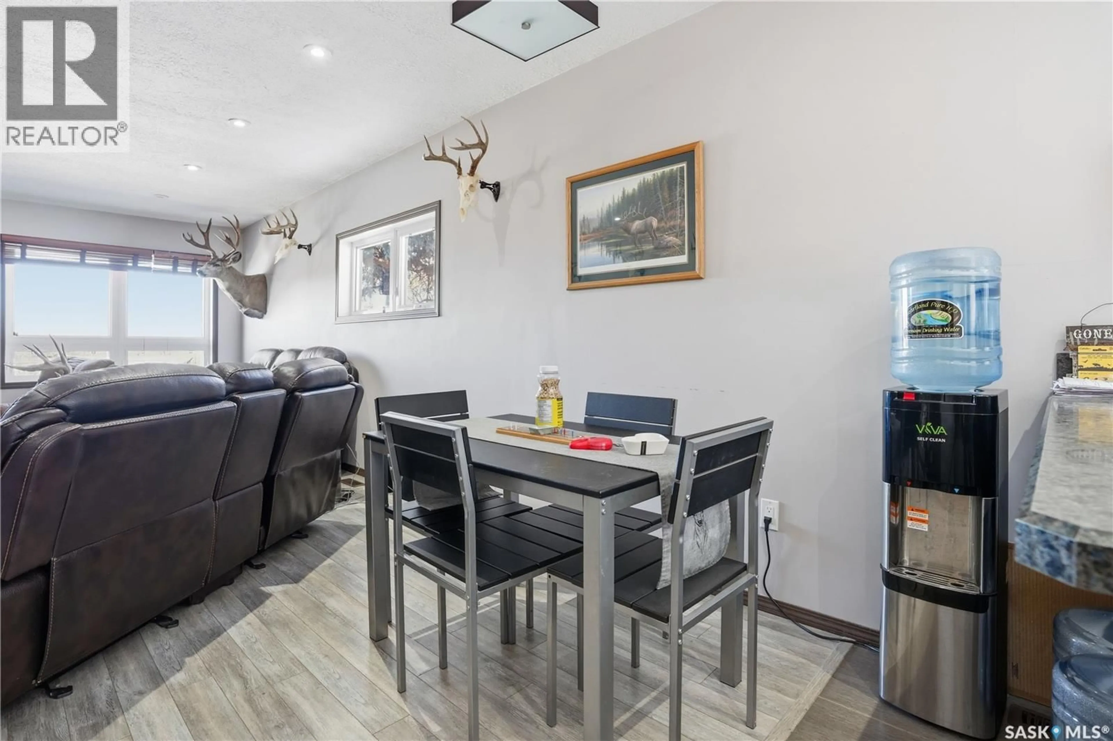 Dining room, wood/laminate floor for 24 ALICE CRESCENT, Marquis Rm No. 191 Saskatchewan S0H4C0