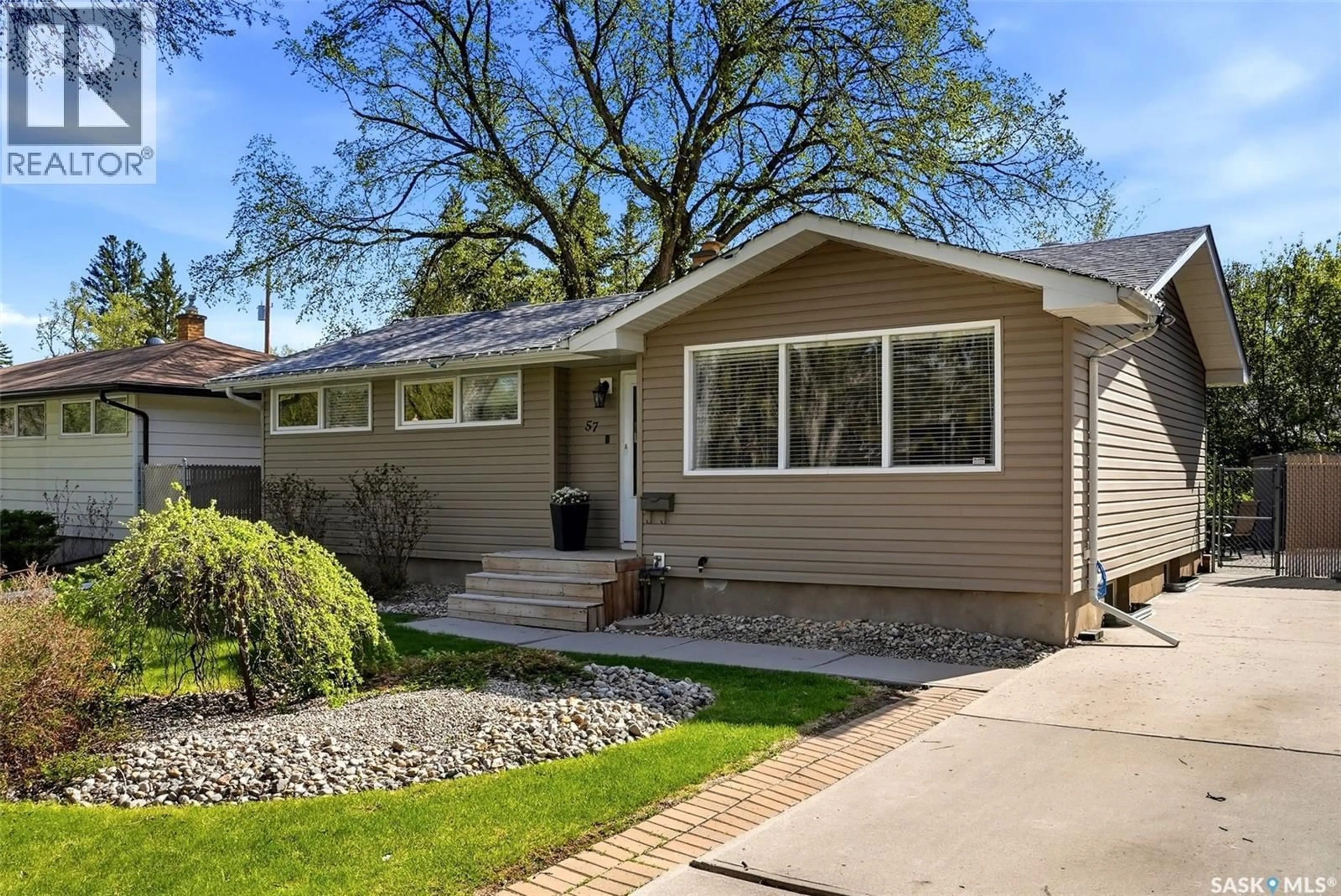 Home with vinyl exterior material, street for 57 FLAMINGO CRESCENT, Regina Saskatchewan S4S4L6