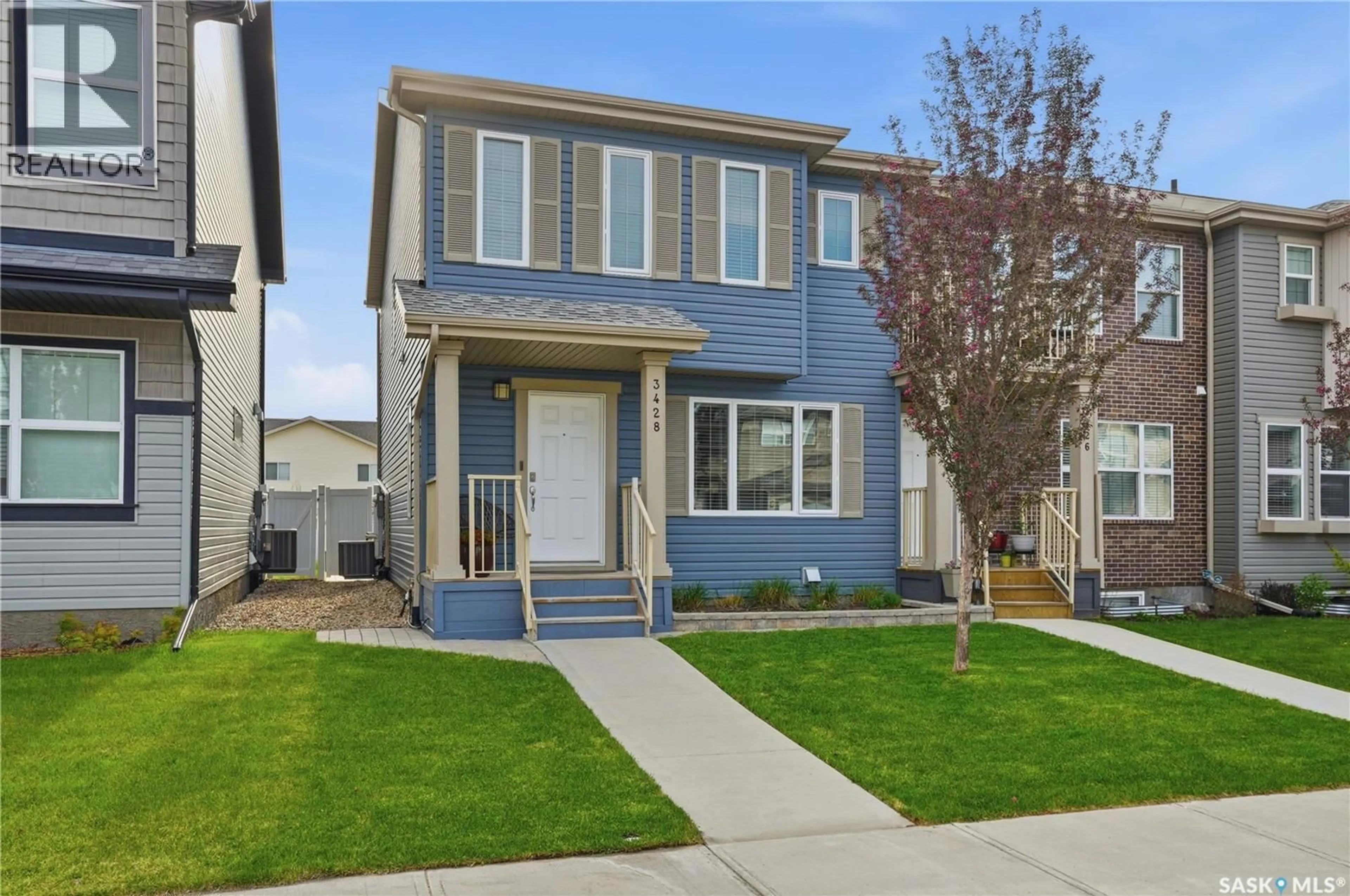 Home with vinyl exterior material, street for 3428 GREEN TURTLE ROAD, Regina Saskatchewan S4V3N7