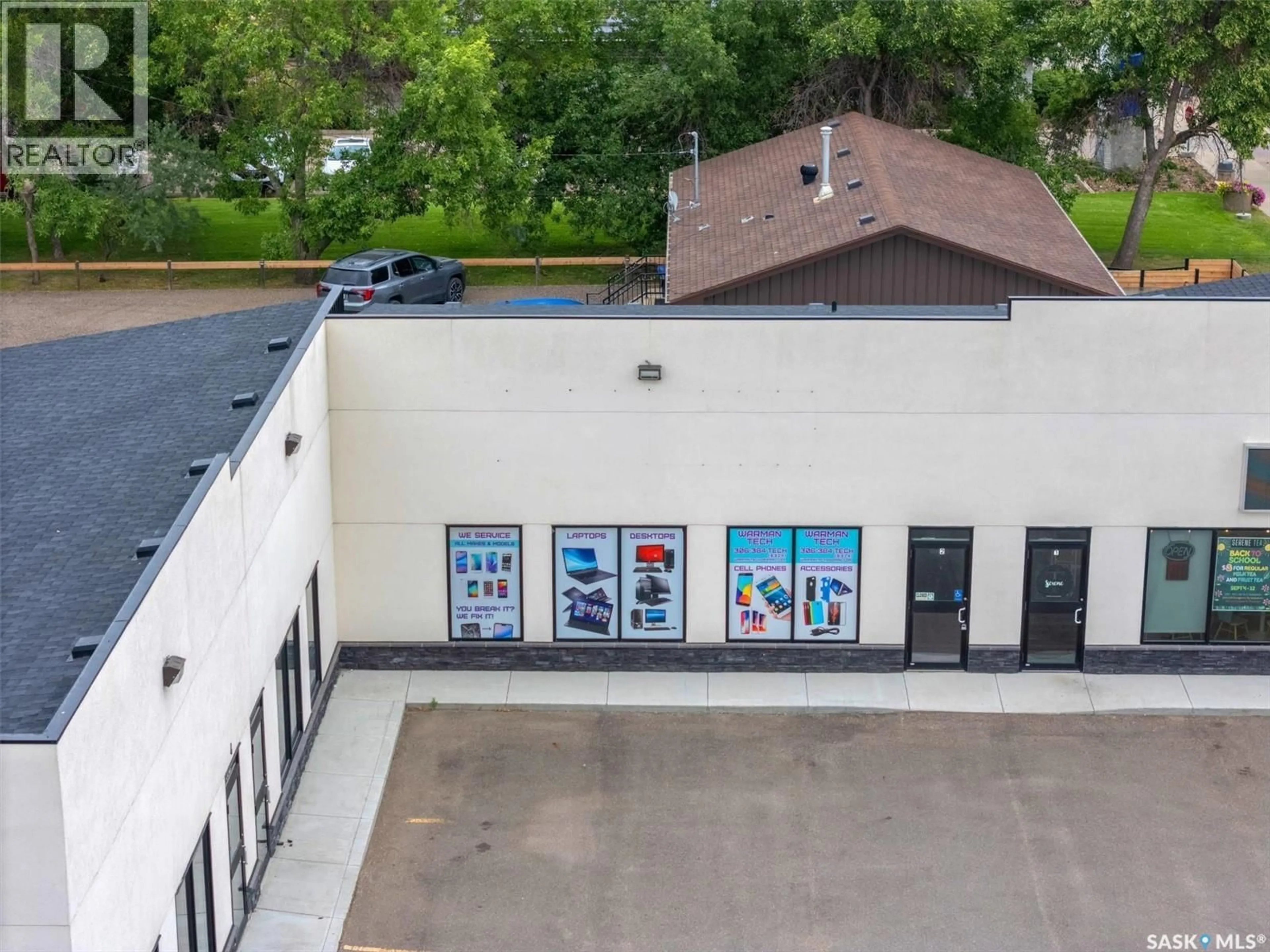 A pic from outside/outdoor area/front of a property/back of a property/a pic from drone, building for 3 212 CENTRAL STREET, Warman Saskatchewan S0K0A1