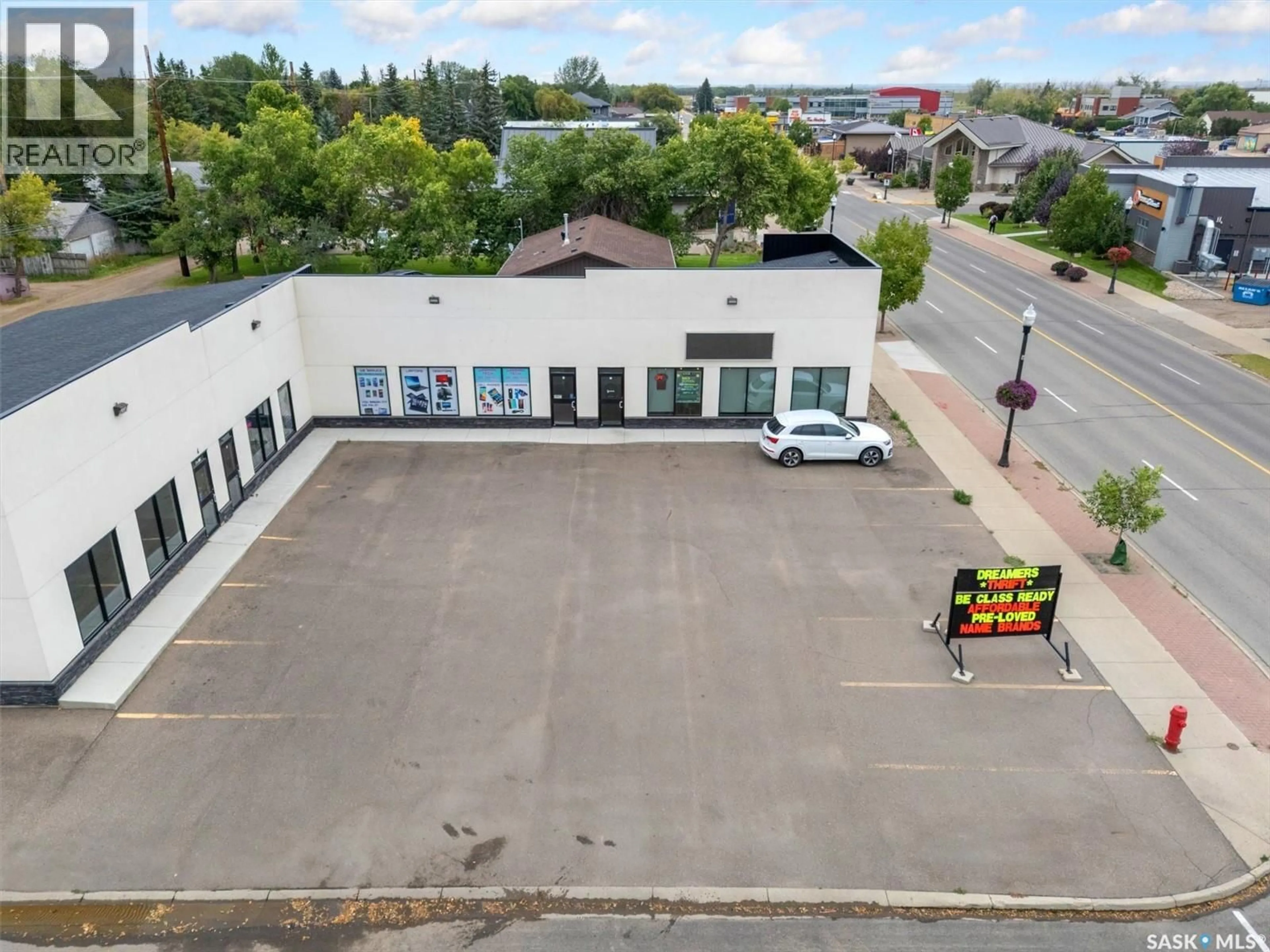 A pic from outside/outdoor area/front of a property/back of a property/a pic from drone, building for 3 212 CENTRAL STREET, Warman Saskatchewan S0K0A1