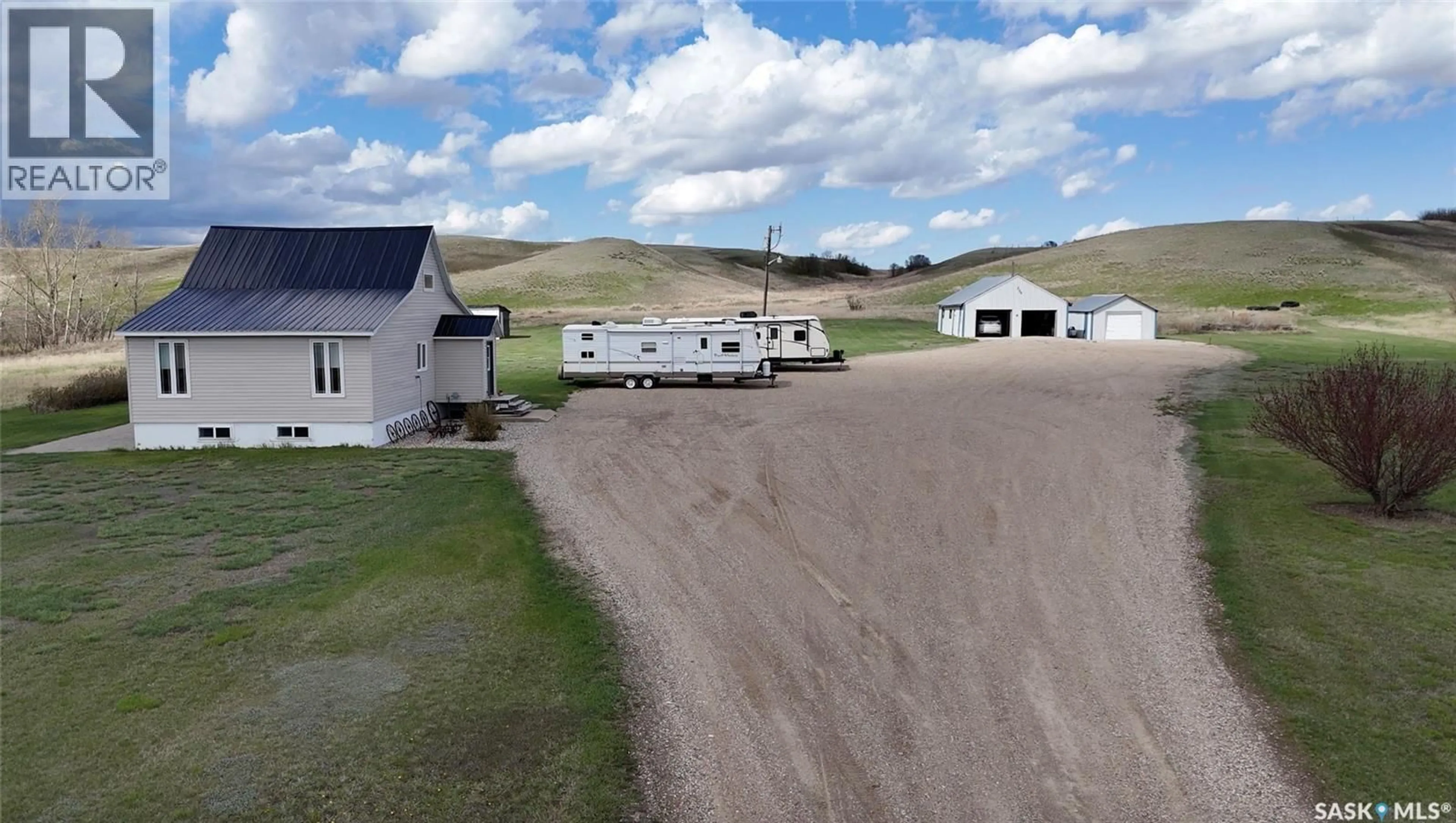 A pic from outside/outdoor area/front of a property/back of a property/a pic from drone, unknown for CRAIK ACREAGE, Craik Saskatchewan S0G0V0
