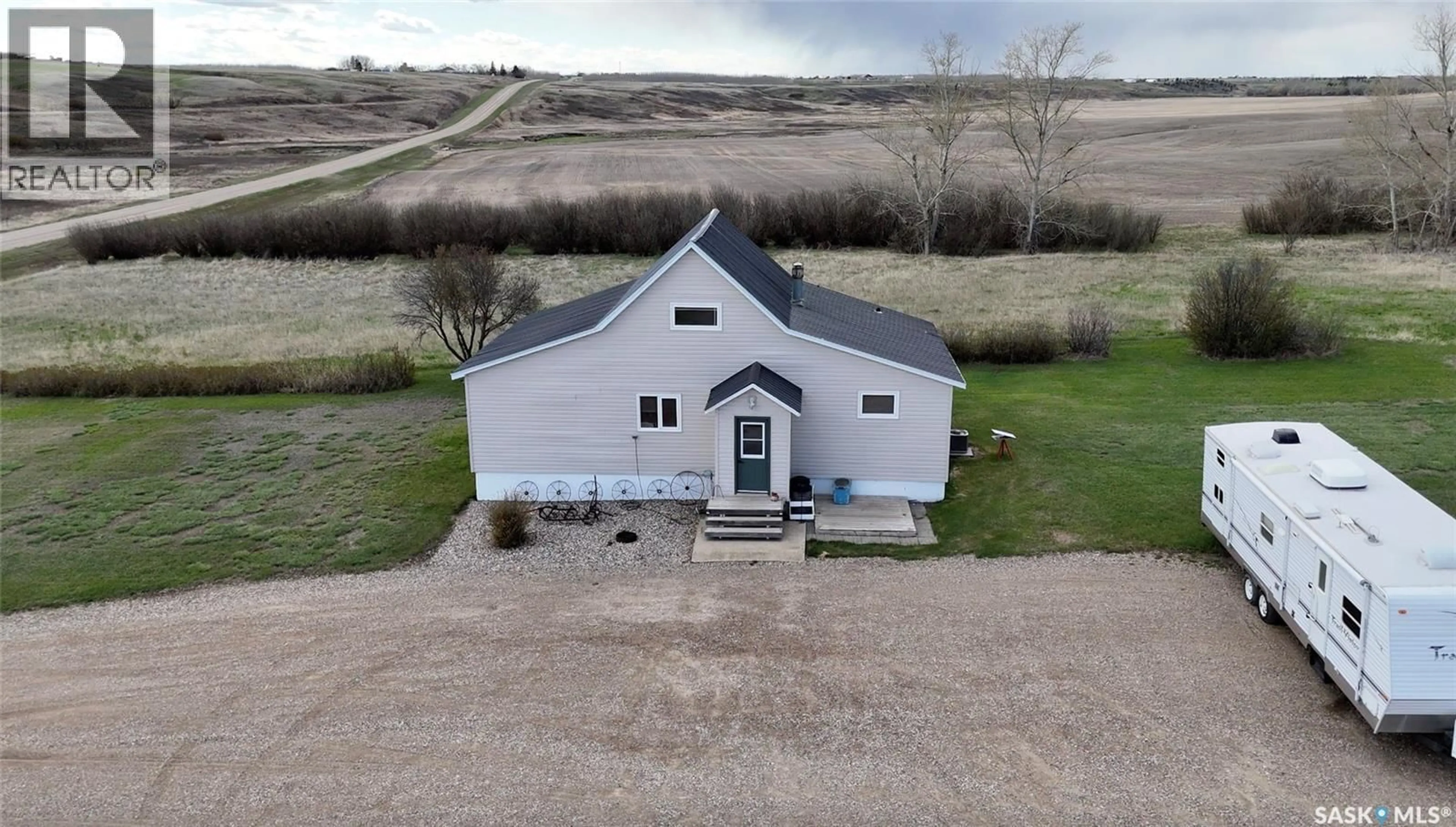 A pic from outside/outdoor area/front of a property/back of a property/a pic from drone, building for CRAIK ACREAGE, Craik Saskatchewan S0G0V0
