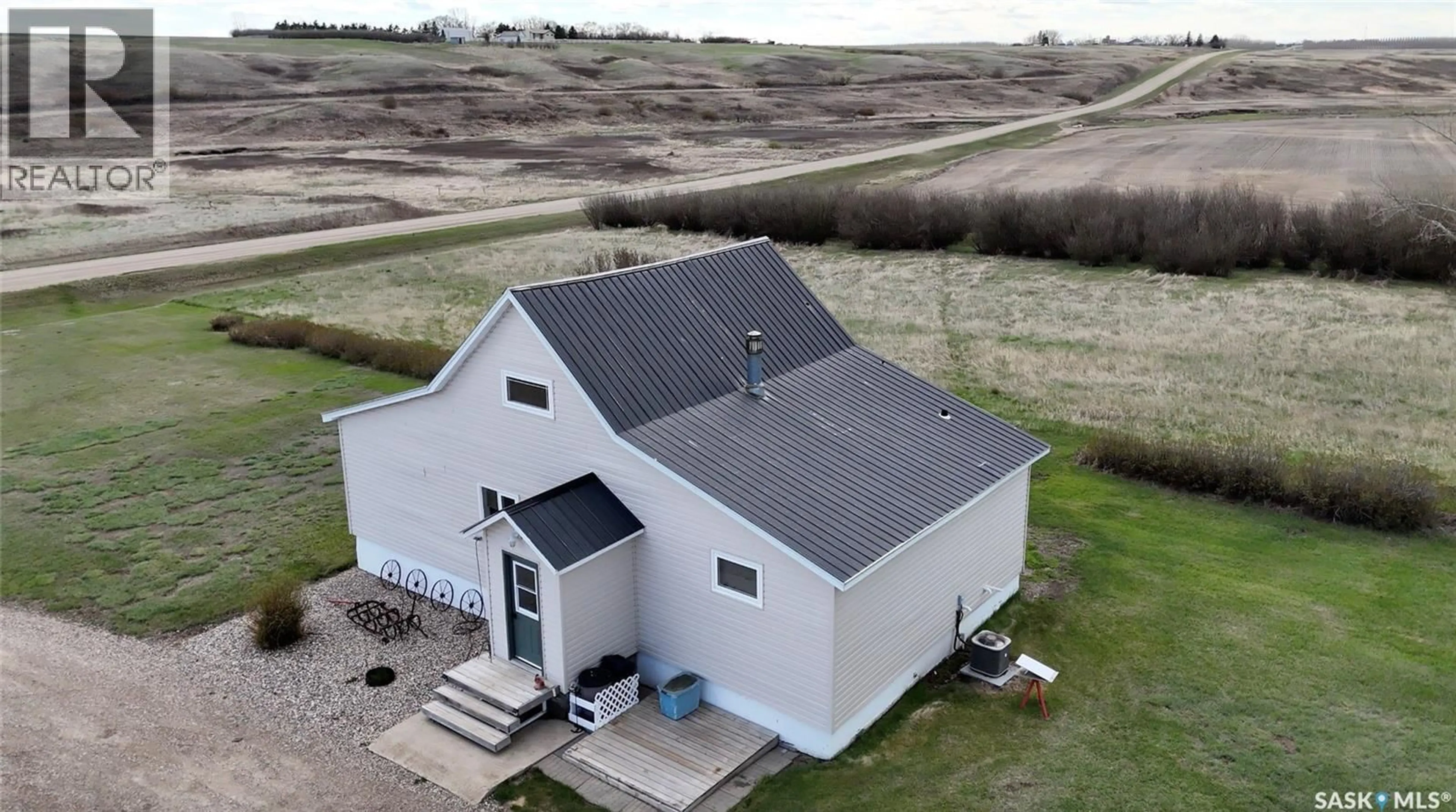 A pic from outside/outdoor area/front of a property/back of a property/a pic from drone, building for CRAIK ACREAGE, Craik Saskatchewan S0G0V0