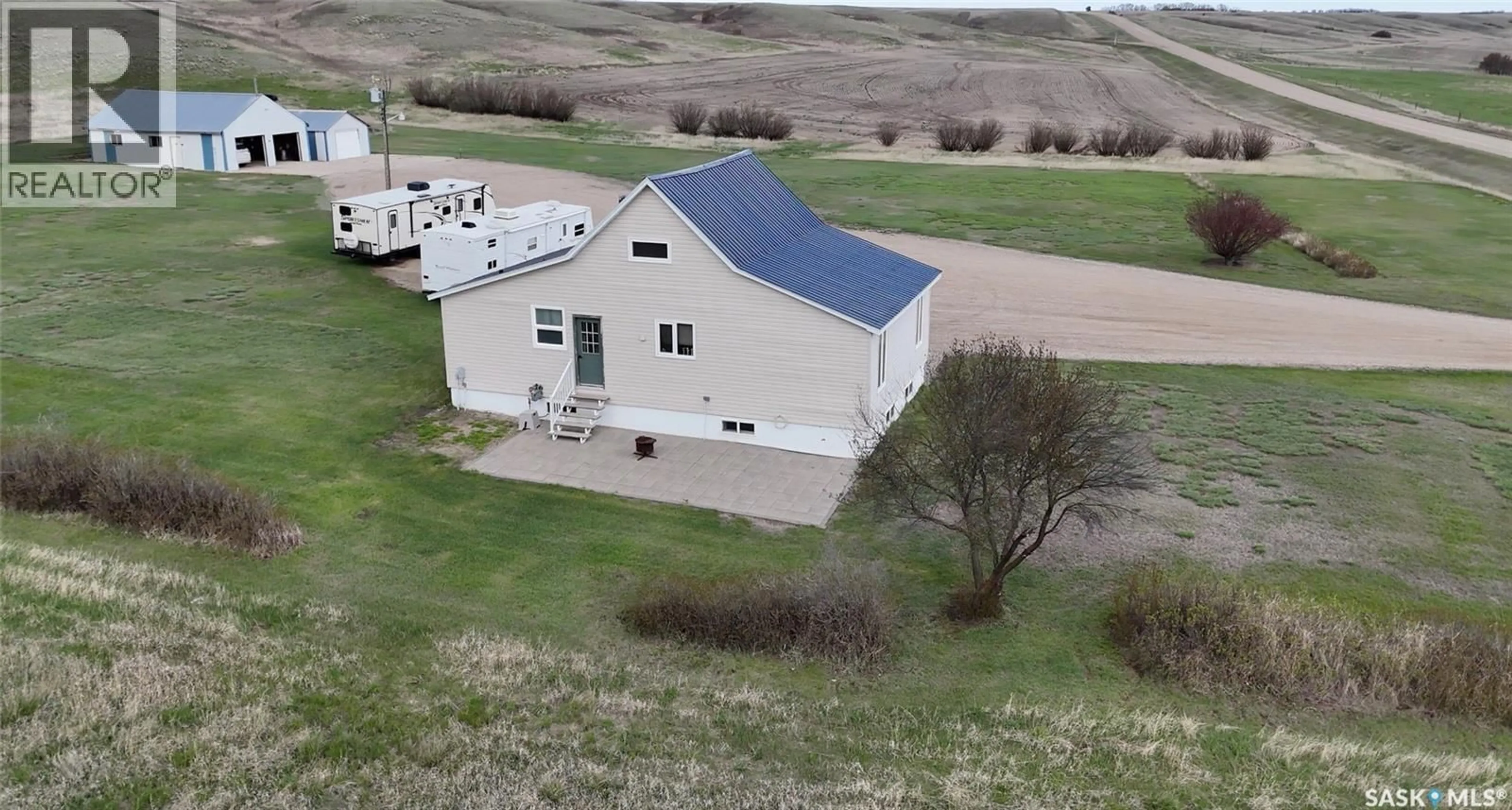 A pic from outside/outdoor area/front of a property/back of a property/a pic from drone, building for CRAIK ACREAGE, Craik Saskatchewan S0G0V0