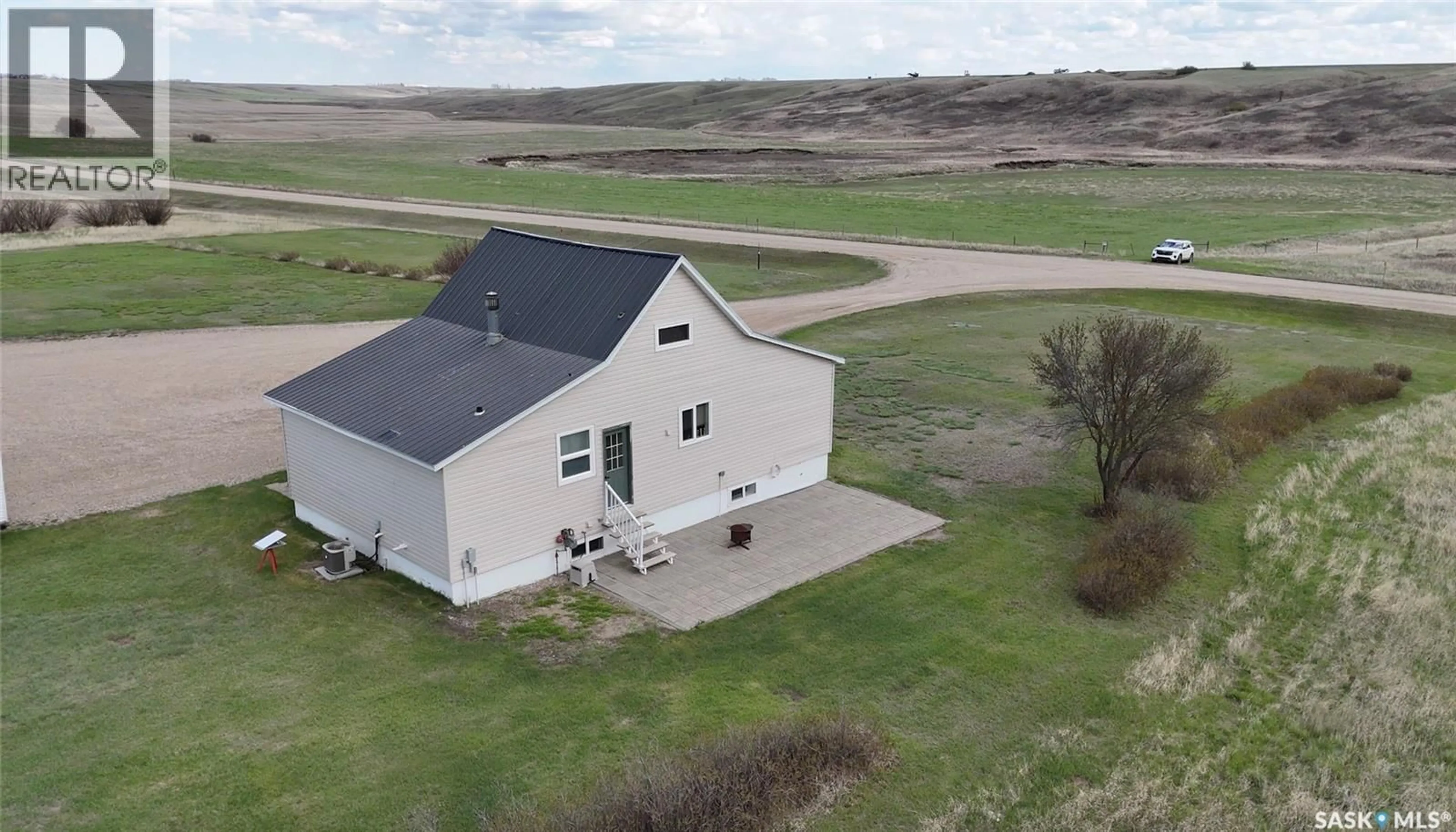 A pic from outside/outdoor area/front of a property/back of a property/a pic from drone, building for CRAIK ACREAGE, Craik Saskatchewan S0G0V0