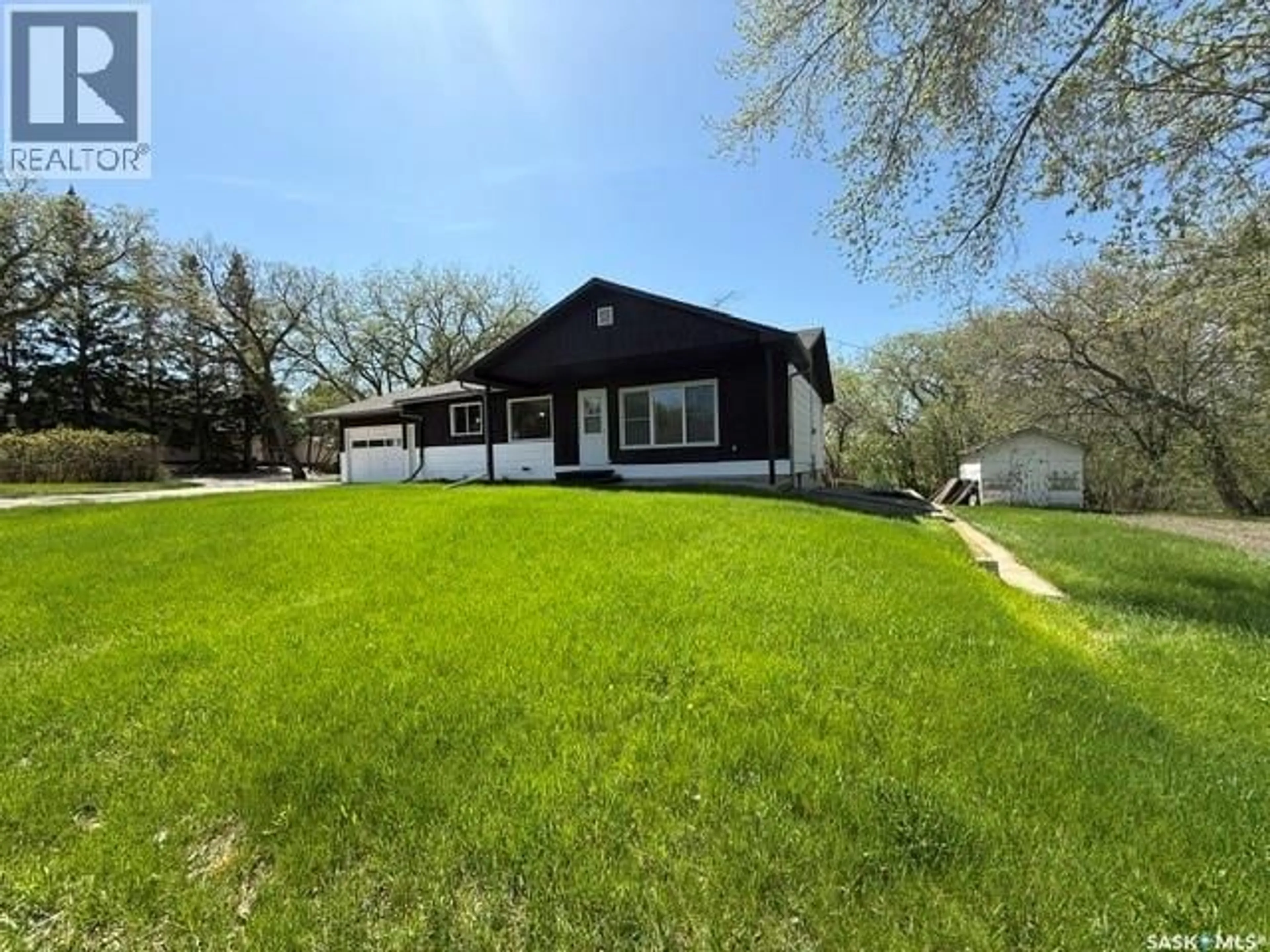 A pic from outside/outdoor area/front of a property/back of a property/a pic from drone, water/lake/river/ocean view for 161 PARK STREET, Kamsack Saskatchewan S0A1S0