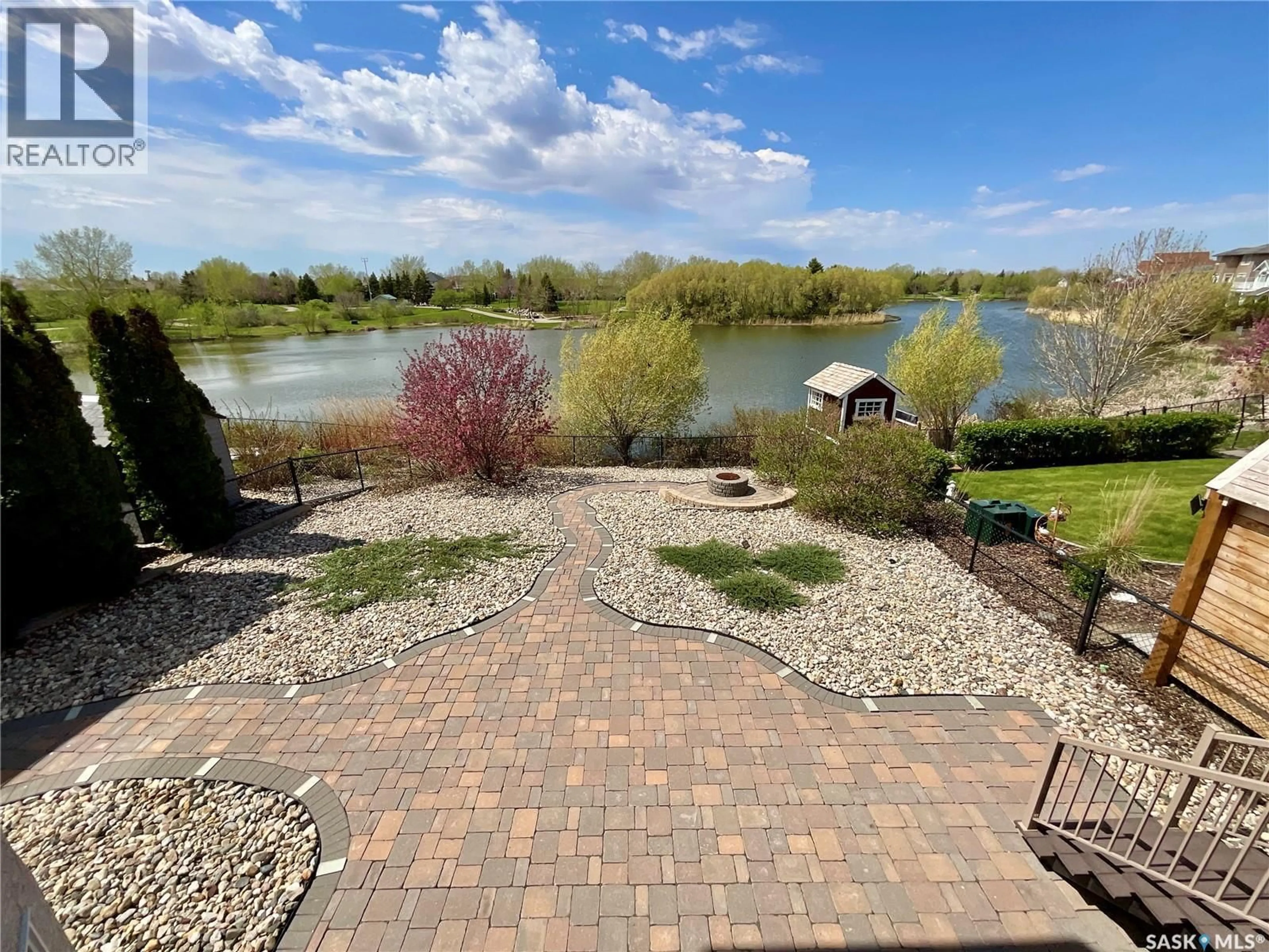 A pic from outside/outdoor area/front of a property/back of a property/a pic from drone, water/lake/river/ocean view for 1538 LAKERIDGE DRIVE, Regina Saskatchewan S4X4L5