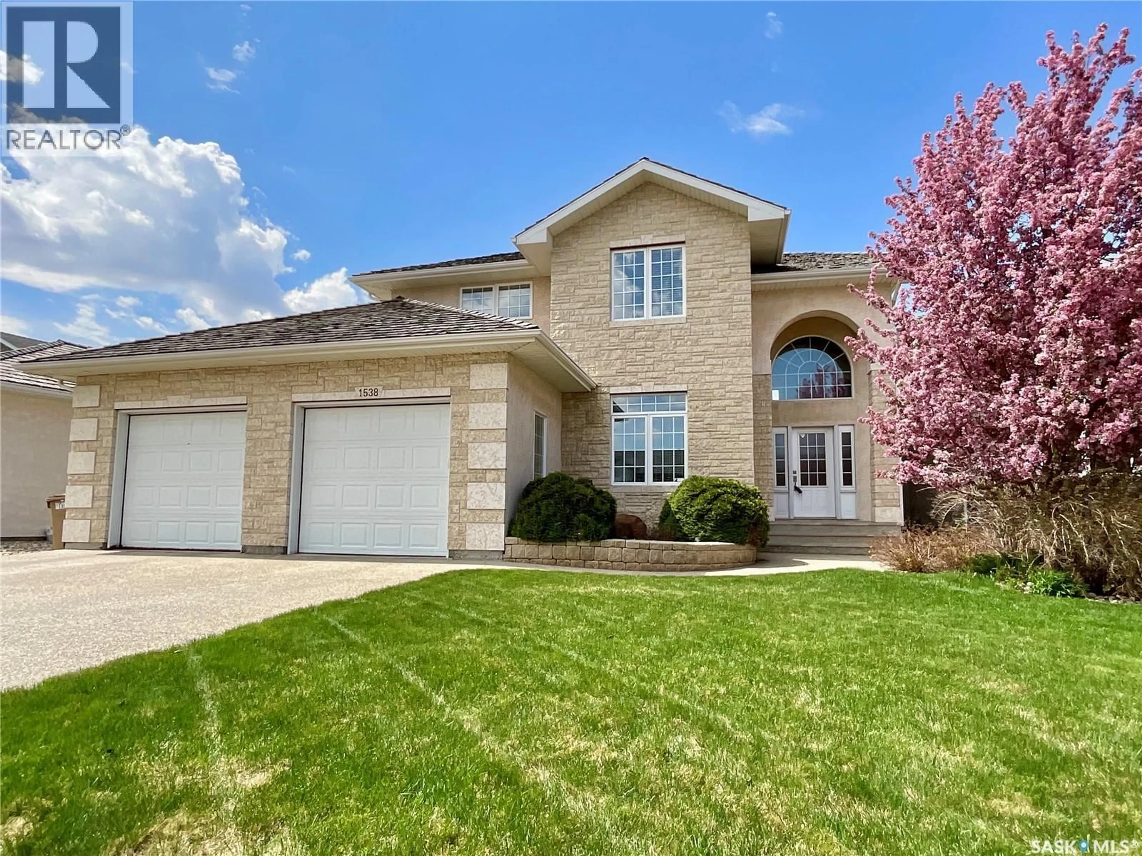 Home with brick exterior material, street for 1538 LAKERIDGE DRIVE, Regina Saskatchewan S4X4L5