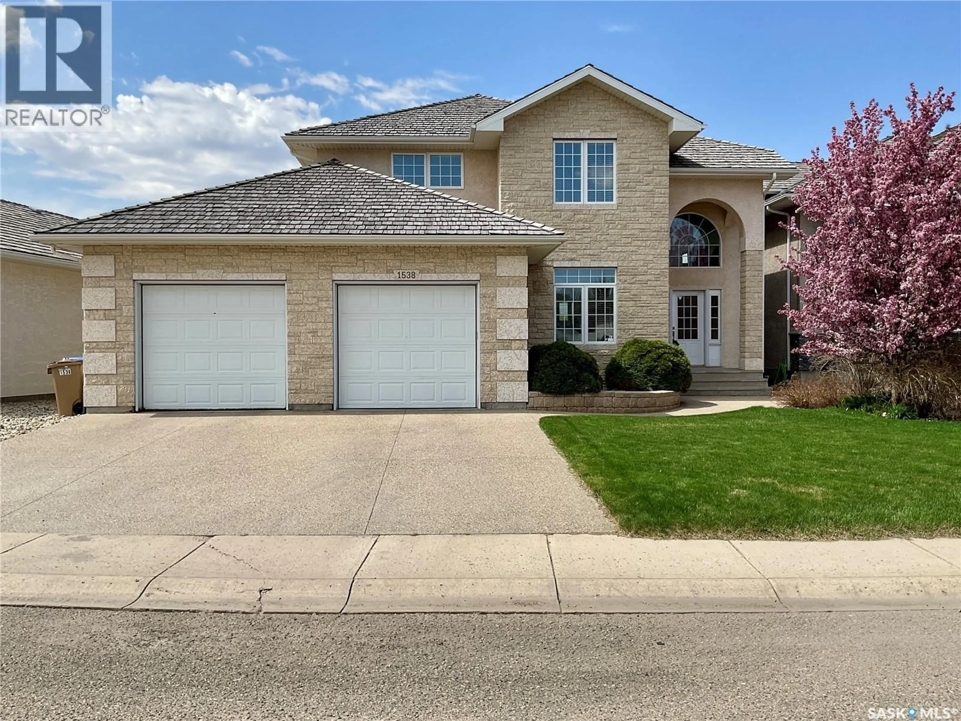 Home with brick exterior material, street for 1538 LAKERIDGE DRIVE, Regina Saskatchewan S4X4L5