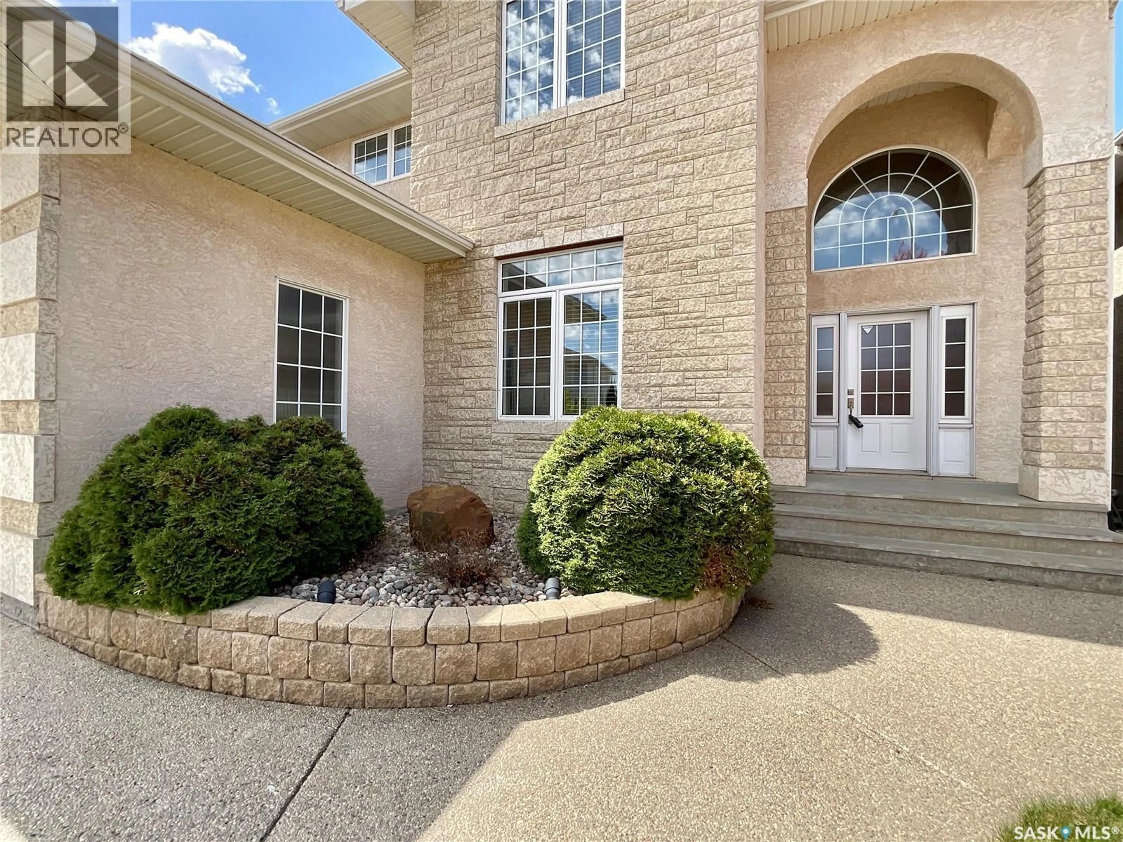 Home with brick exterior material, street for 1538 LAKERIDGE DRIVE, Regina Saskatchewan S4X4L5