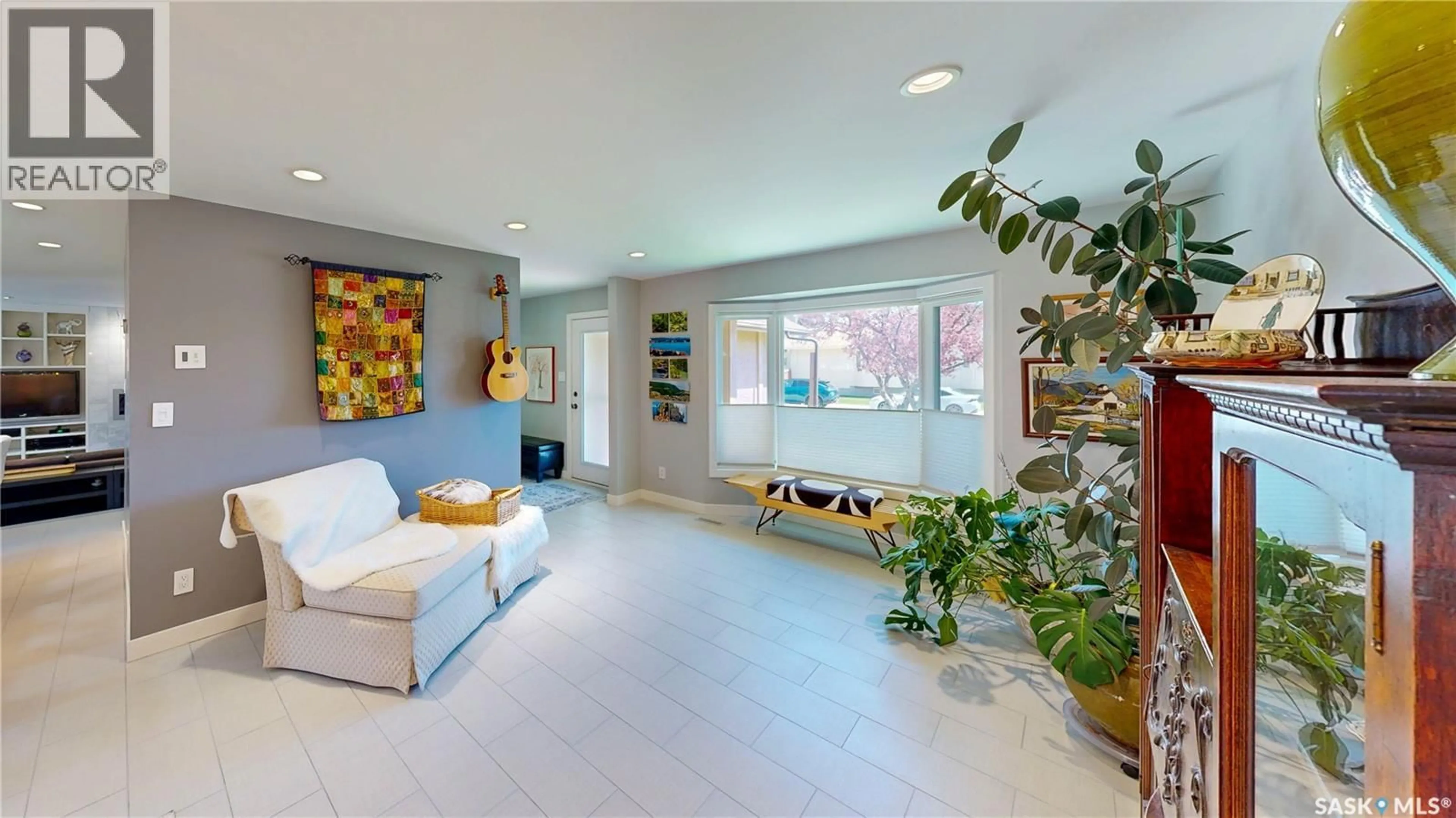 Living room with furniture, ceramic/tile floor for 3054 REVES ROAD, Regina Saskatchewan S4V1Y6