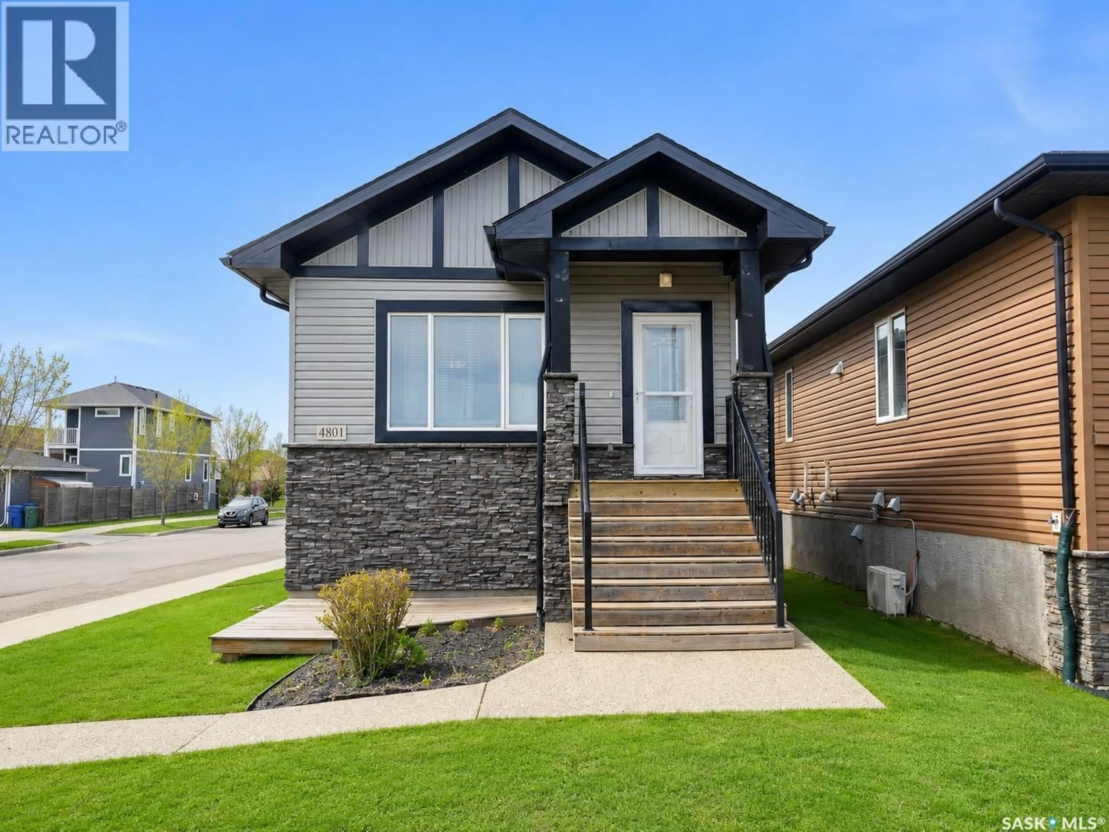 Home with brick exterior material, street for 4801 JAMES HILL ROAD, Regina Saskatchewan S4W0C6