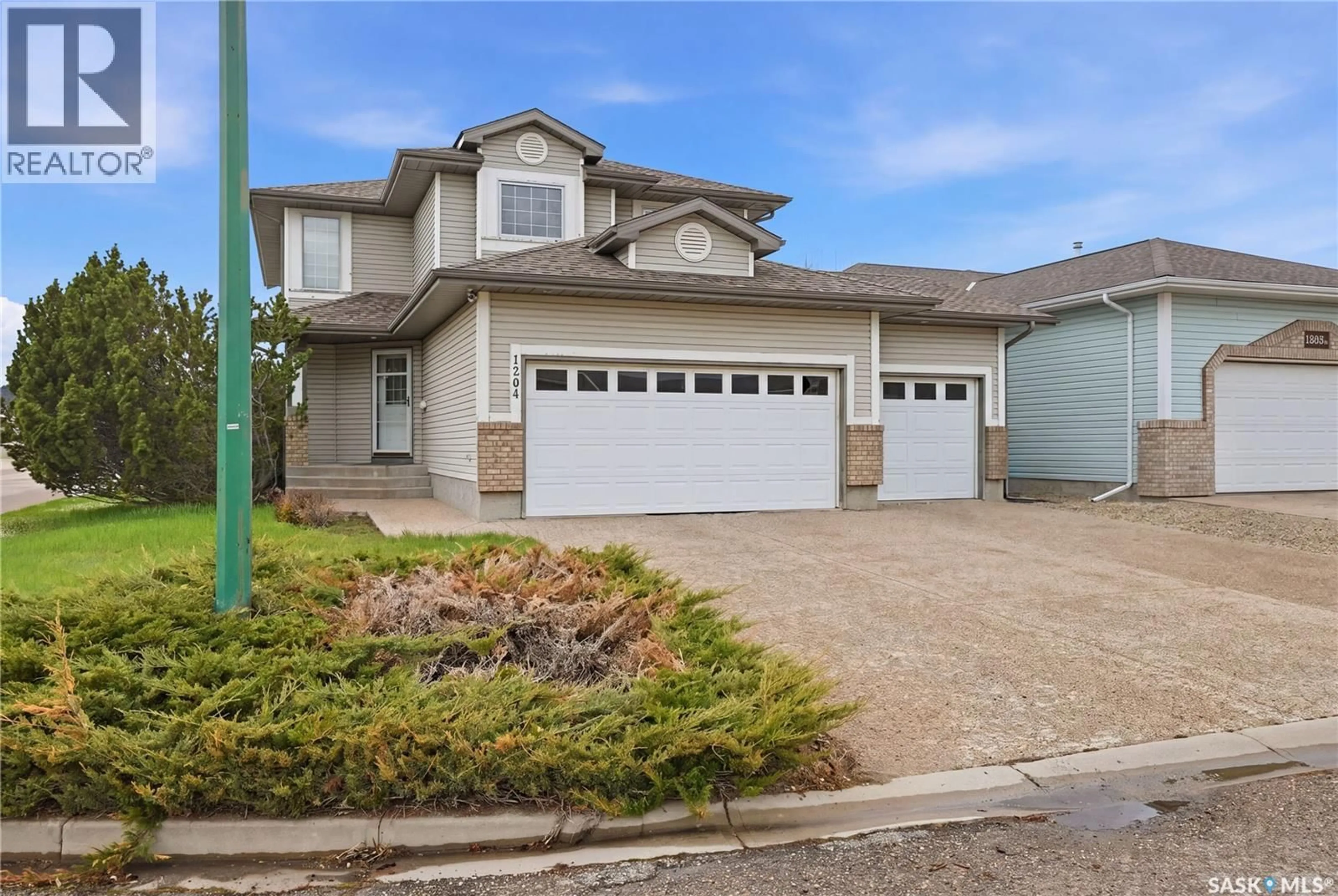 Home with vinyl exterior material, street for N - 1204 BOEHM BAY, Regina Saskatchewan S4X4M2