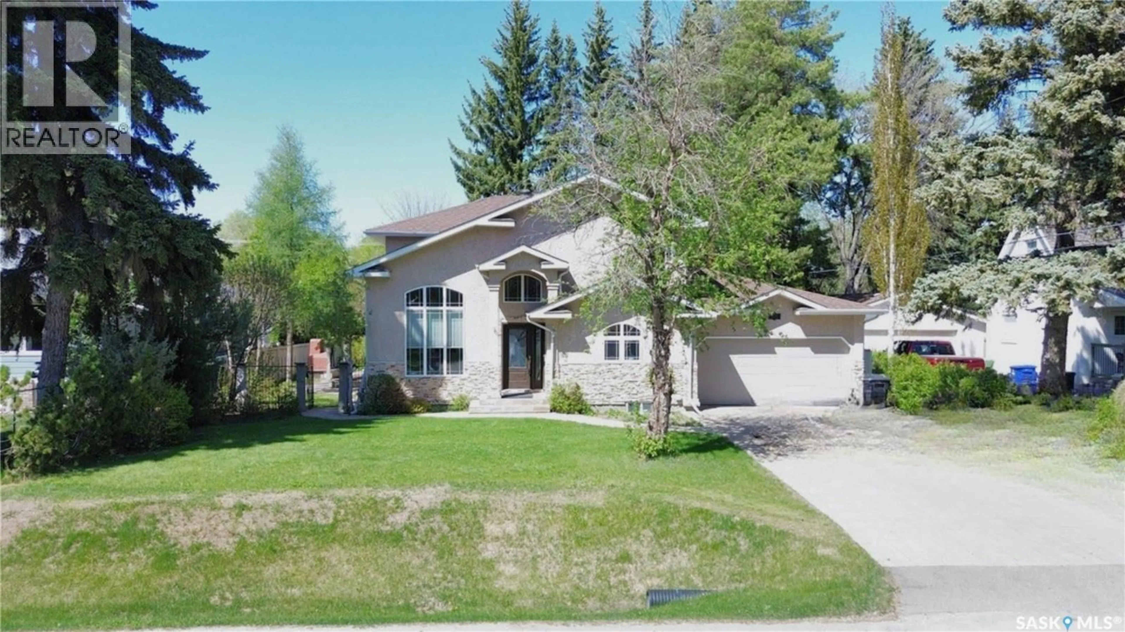 Home with vinyl exterior material, street for 3150 CAEN STREET, Saskatoon Saskatchewan S7M3N5