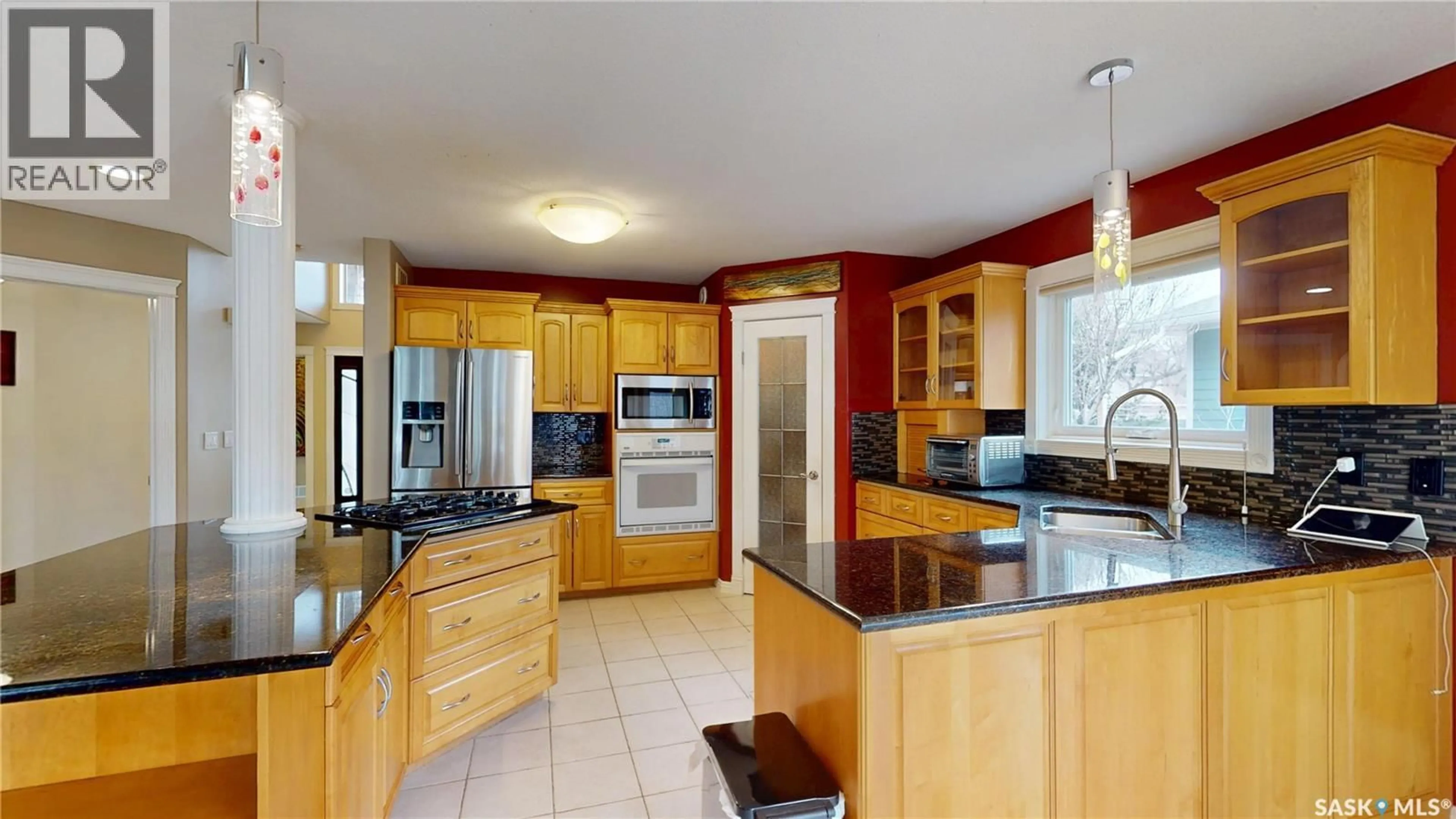Open concept kitchen, ceramic/tile floor for 3150 CAEN STREET, Saskatoon Saskatchewan S7M3N5