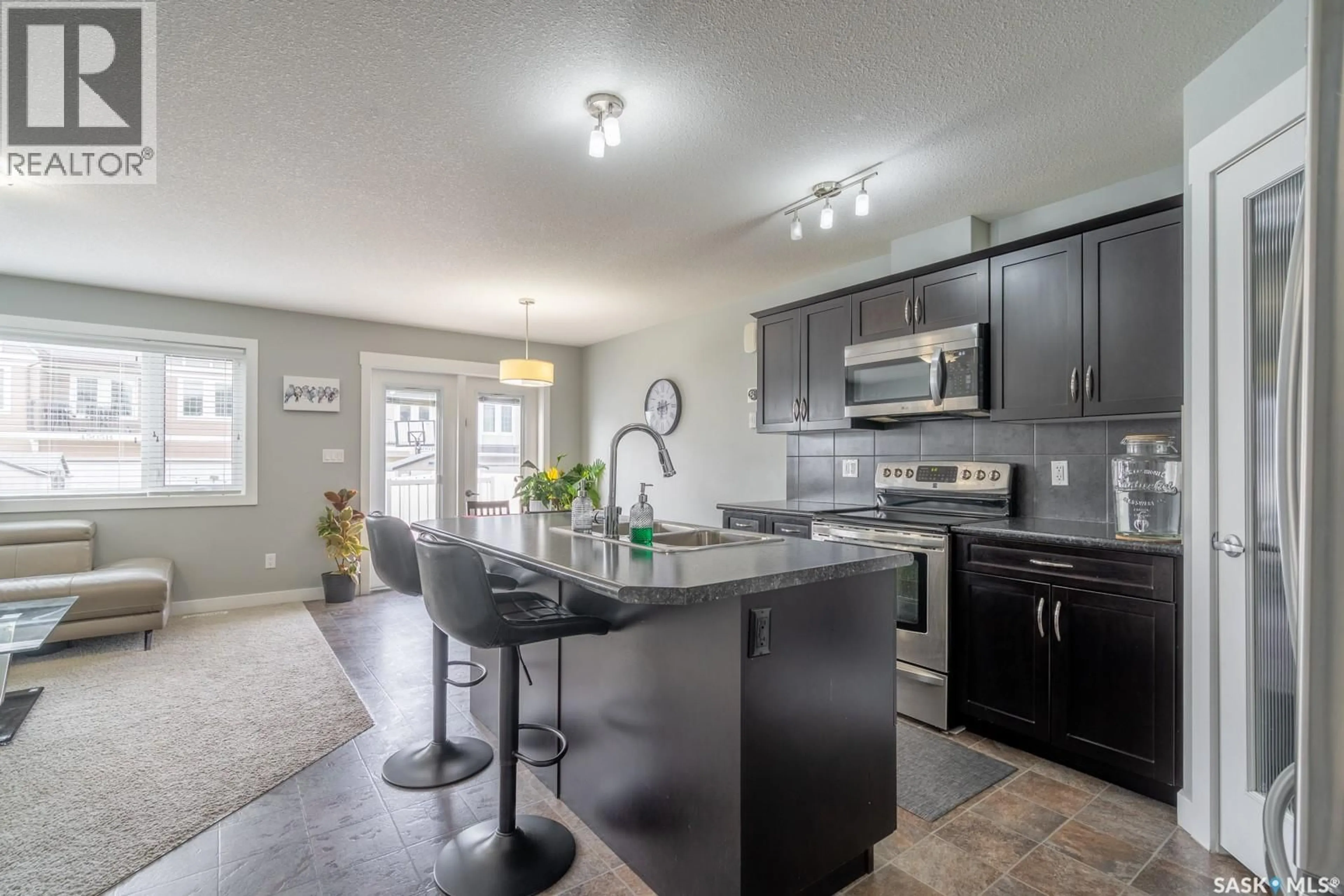 Open concept kitchen, unknown for 4510 GREEN LANE, Regina Saskatchewan S4V3H5