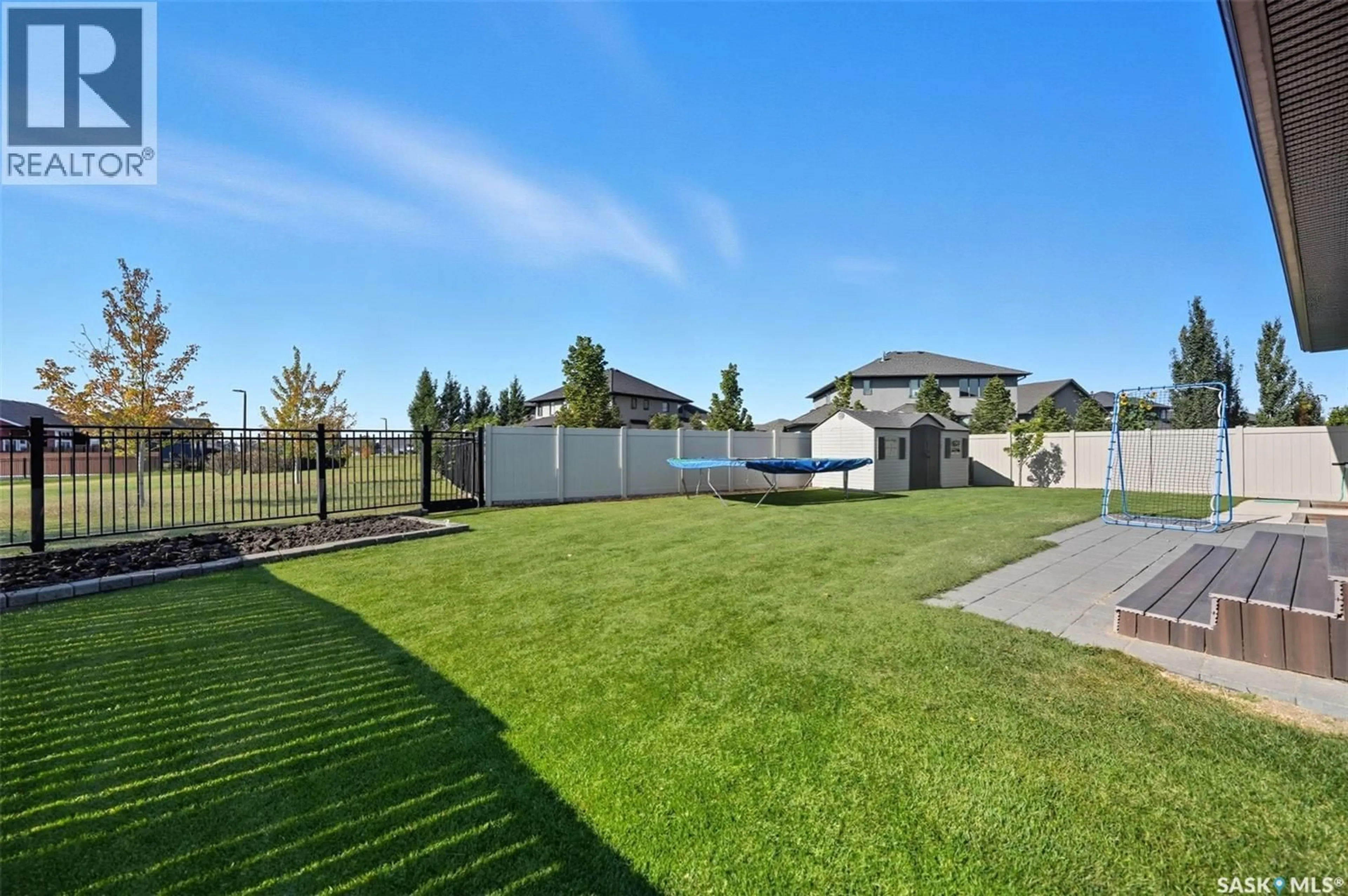 A pic from outside/outdoor area/front of a property/back of a property/a pic from drone, mountain view for 806 GILLIES CRESCENT, Saskatoon Saskatchewan S7V0C2