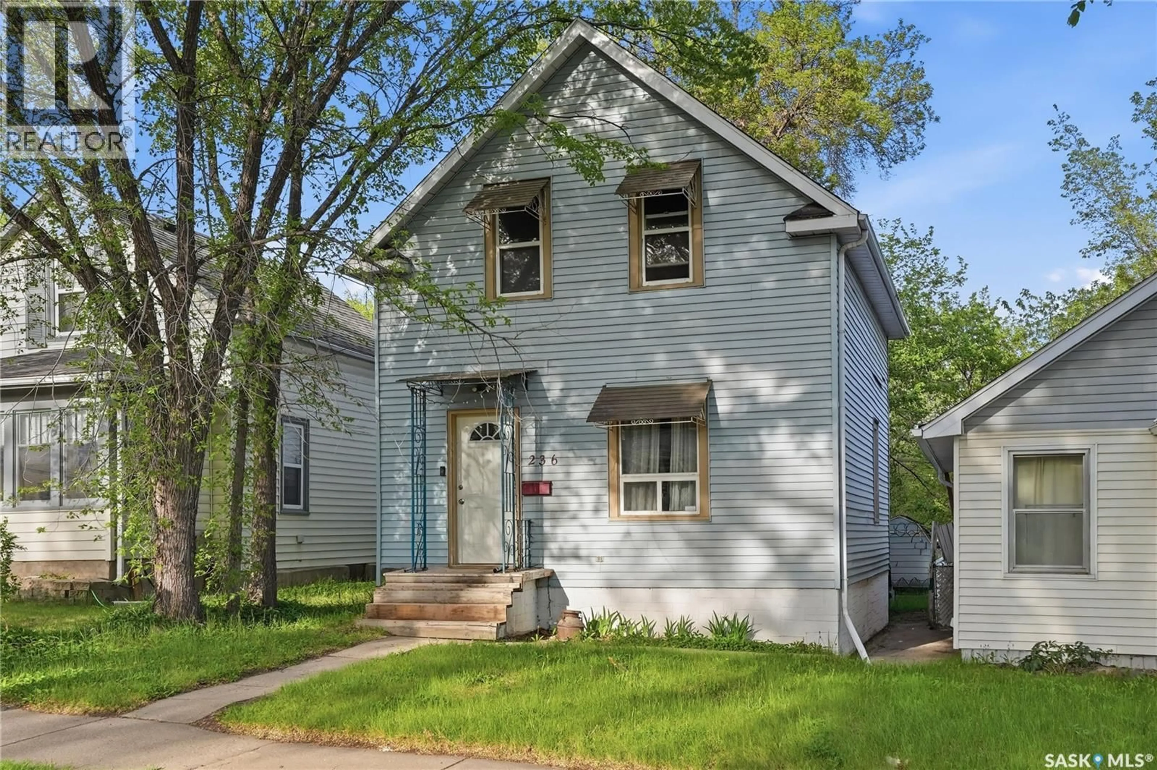 Home with vinyl exterior material, street for 236 I AVENUE, Saskatoon Saskatchewan S7L0G4
