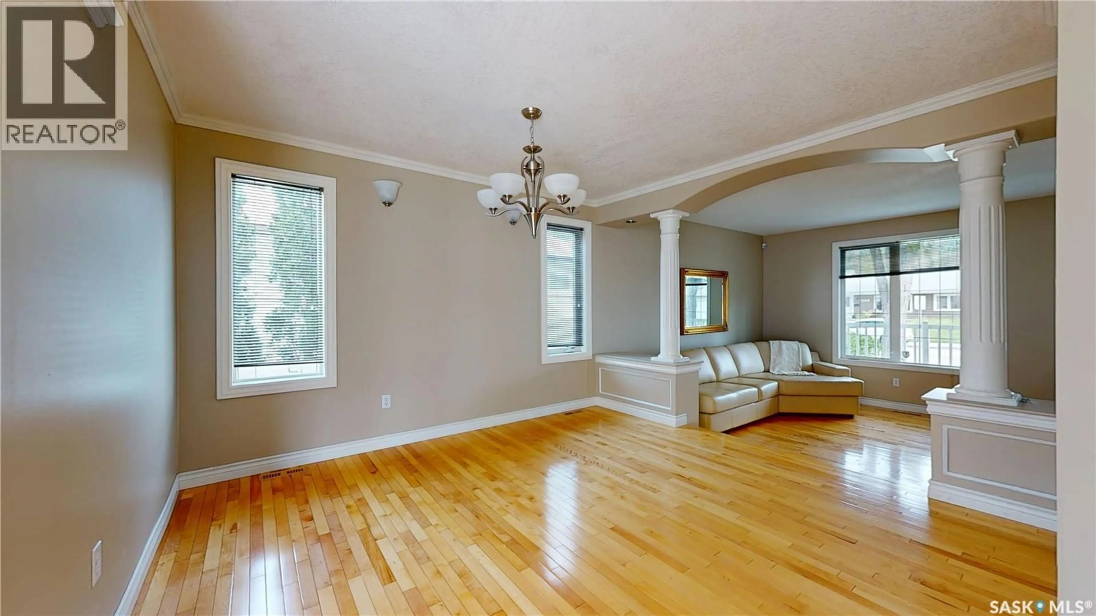 Living room with furniture, wood/laminate floor for 1358 FORGET STREET, Regina Saskatchewan S4T4Y1
