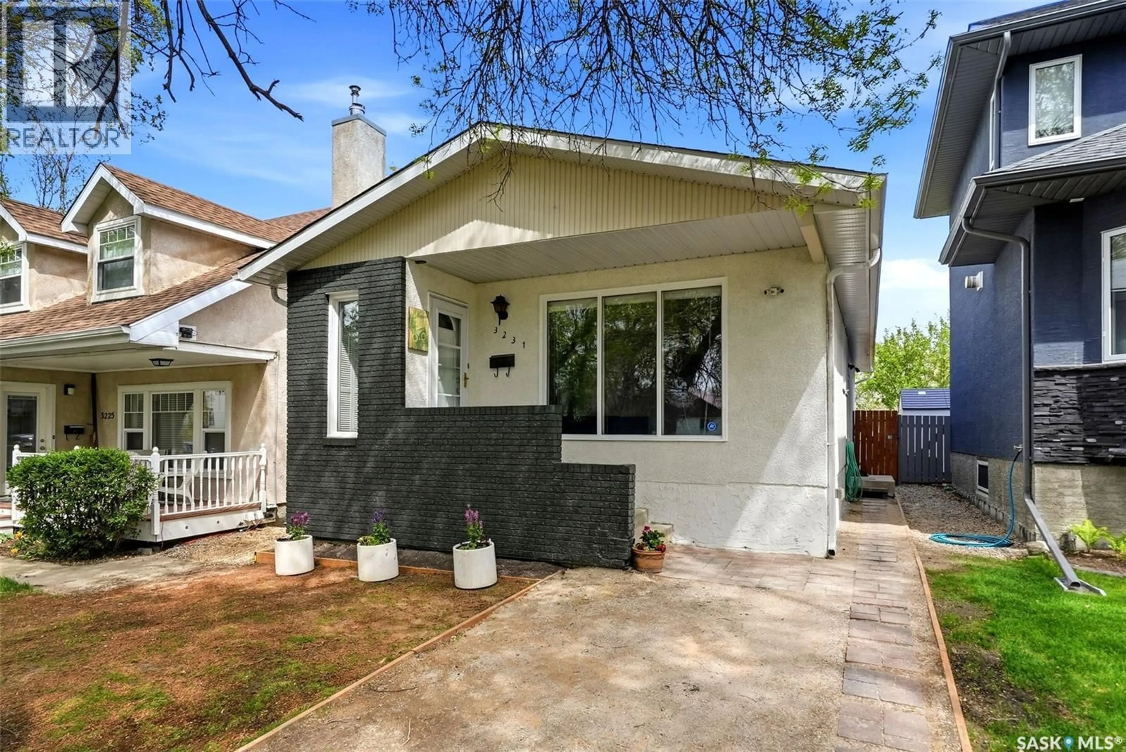 Home with vinyl exterior material, street for 3231 RETALLACK STREET, Regina Saskatchewan S4S1T7