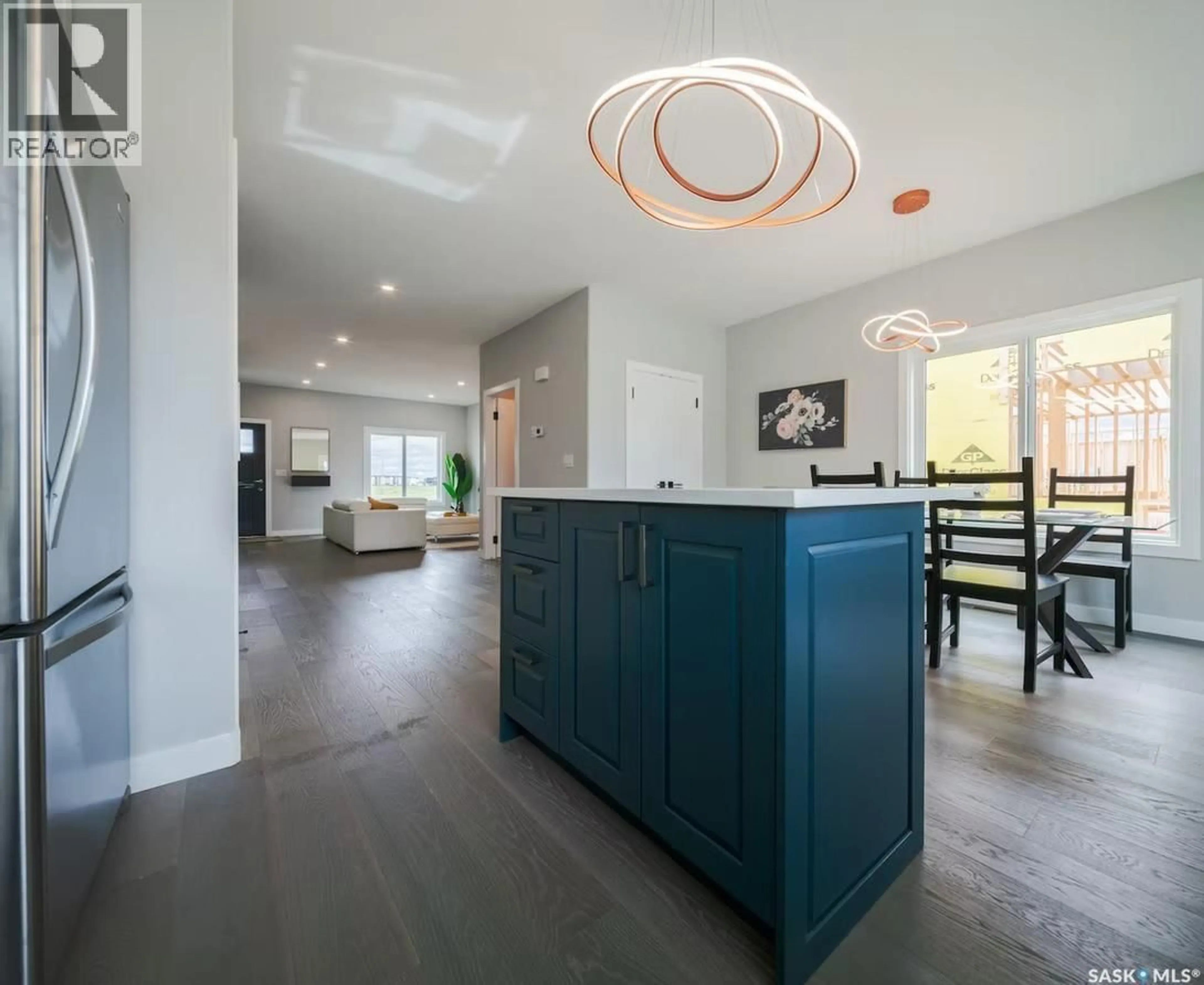 Open concept kitchen, unknown for 211 FEHEREGYHAZI BOULEVARD, Saskatoon Saskatchewan S7W0C2
