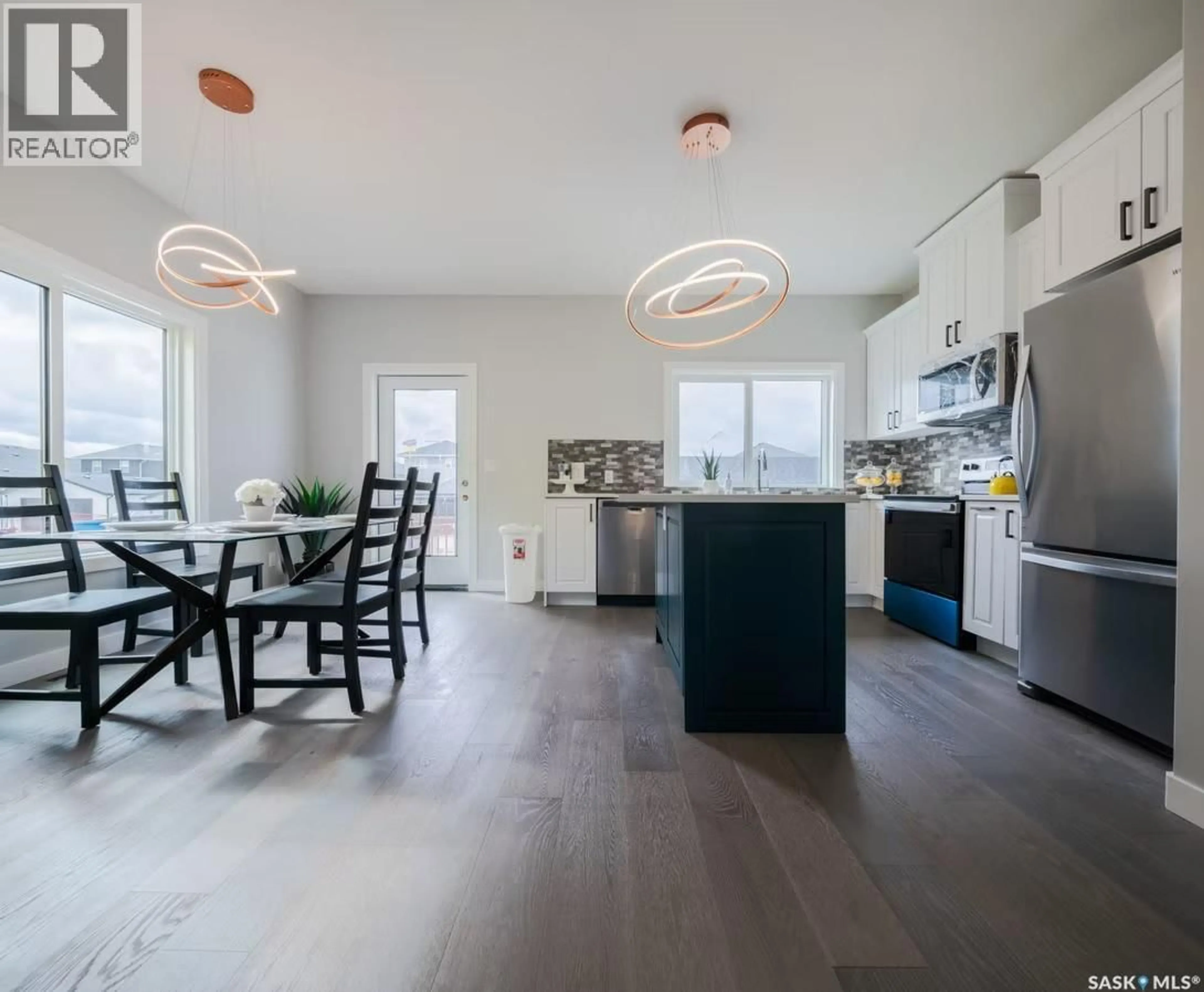 Open concept kitchen, unknown for 211 FEHEREGYHAZI BOULEVARD, Saskatoon Saskatchewan S7W0C2
