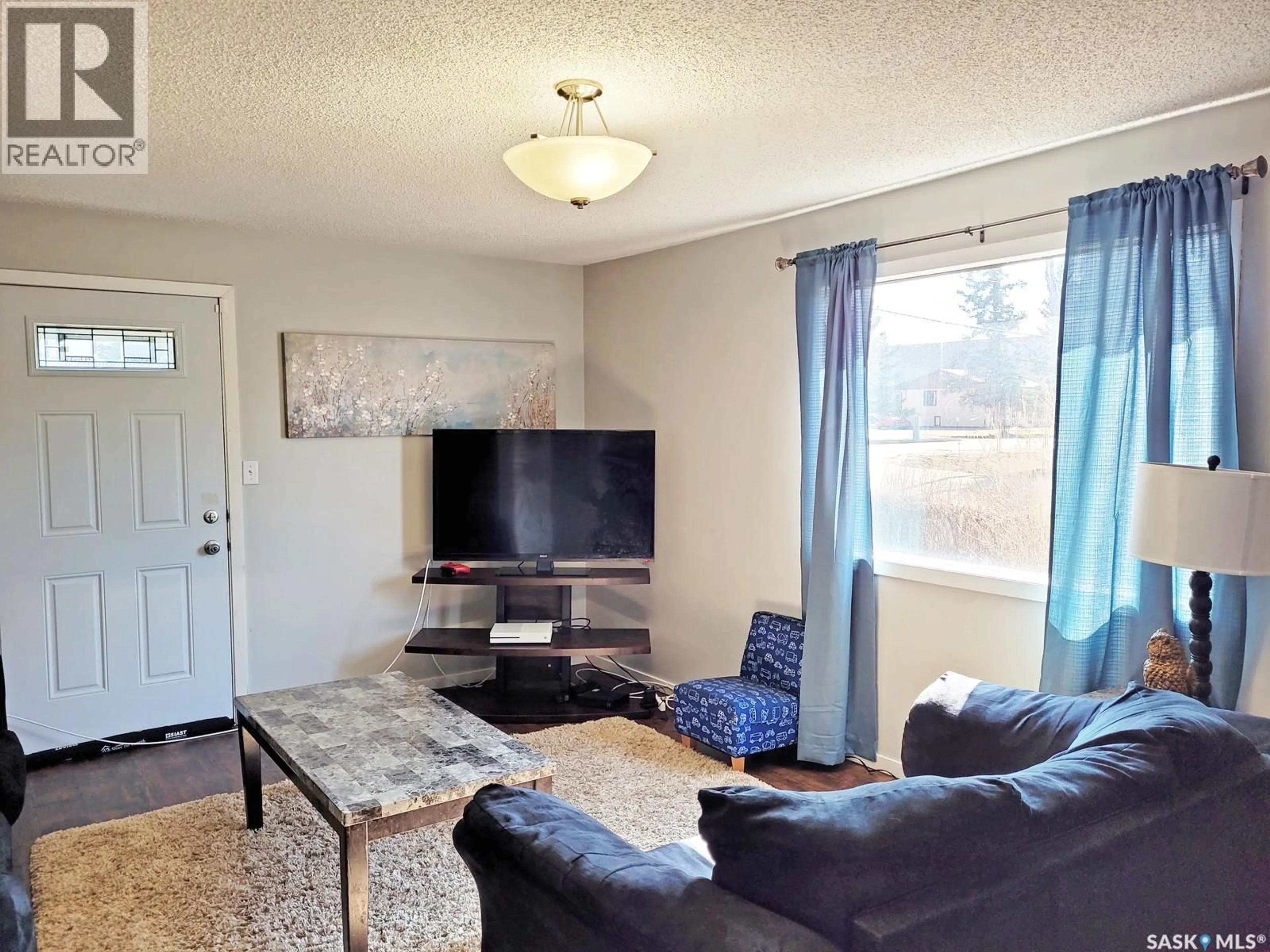 Living room with furniture, unknown for 601 3RD AVENUE, Meadow Lake Saskatchewan S9X1H7