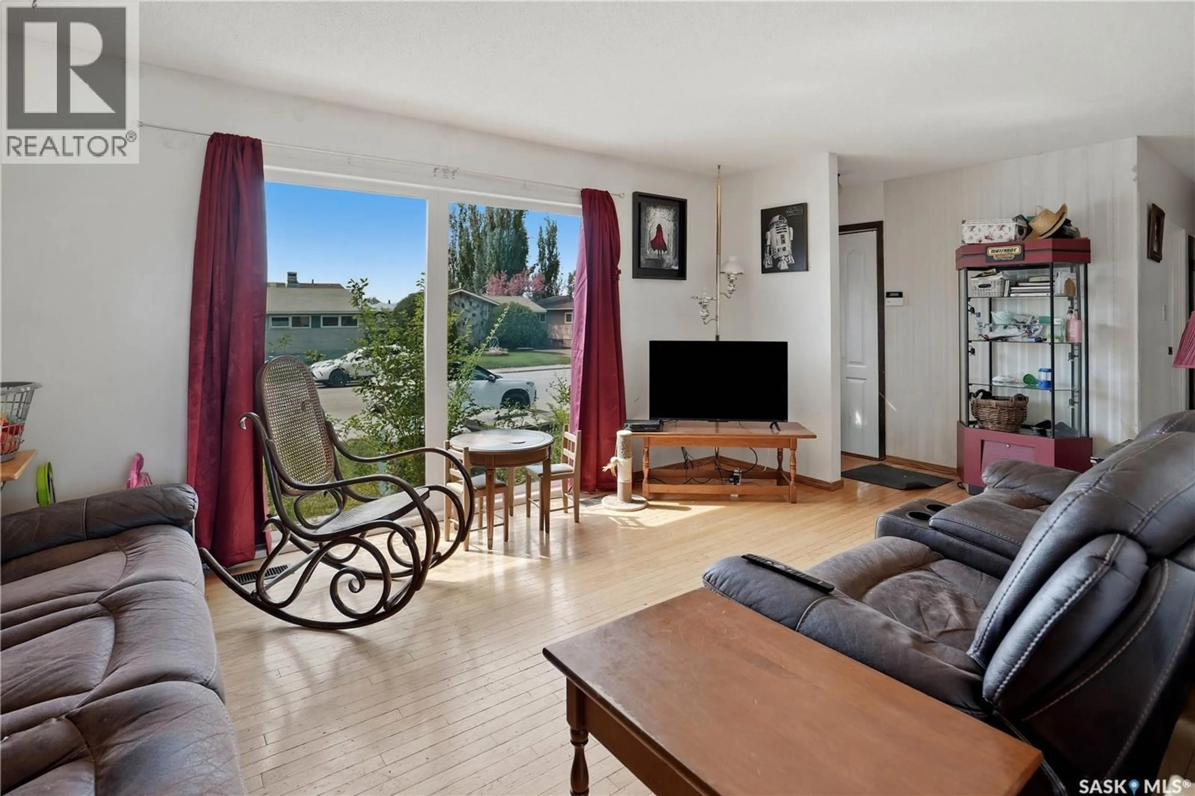 Living room with furniture, unknown for 2106 101ST CRESCENT, North Battleford Saskatchewan S9A1C3