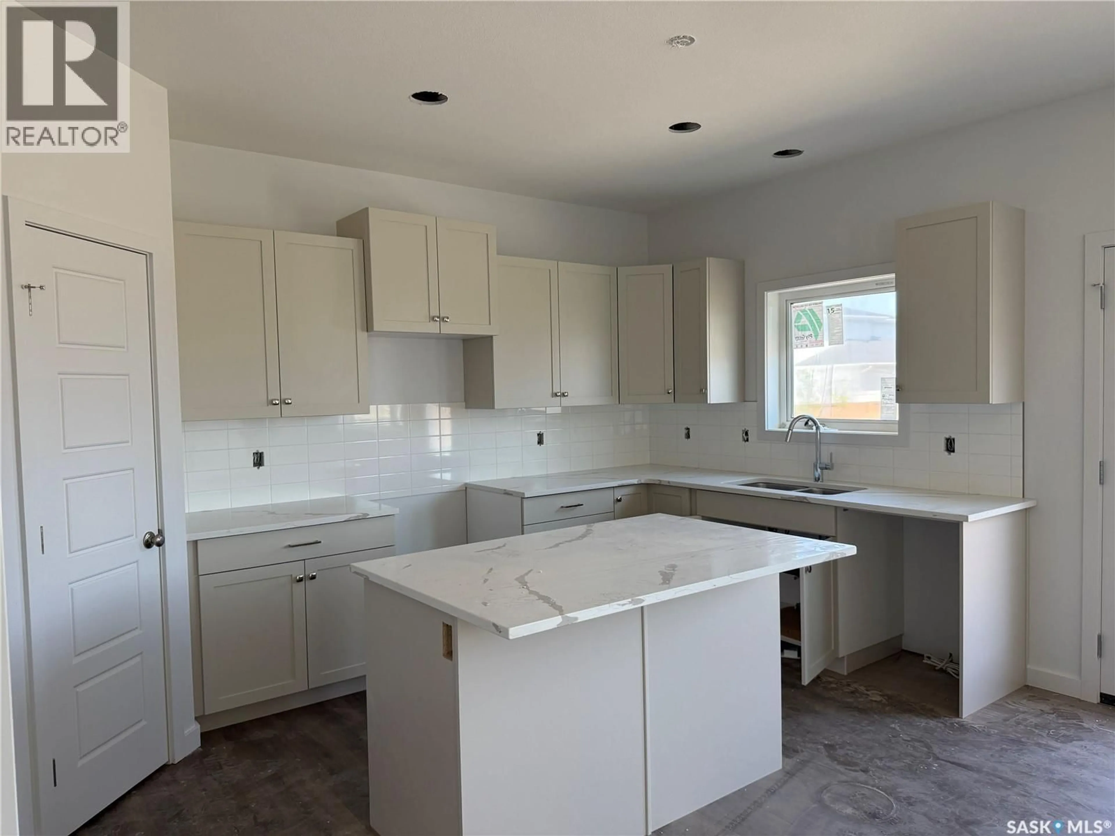 Open concept kitchen, ceramic/tile floor for 327 COWESSESS ROAD, Saskatoon Saskatchewan S7V1Y4