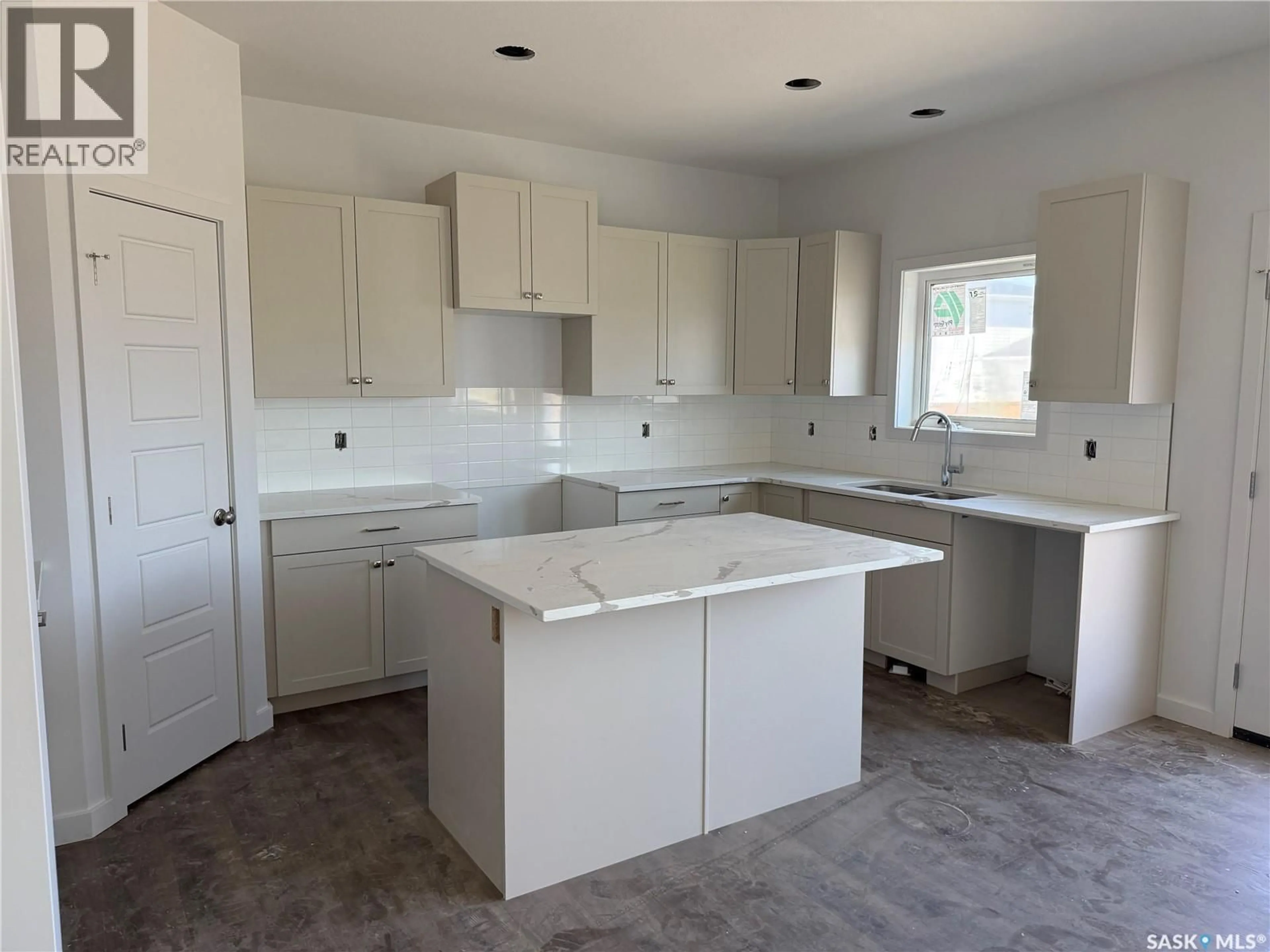 Open concept kitchen, ceramic/tile floor for 327 COWESSESS ROAD, Saskatoon Saskatchewan S7V1Y4