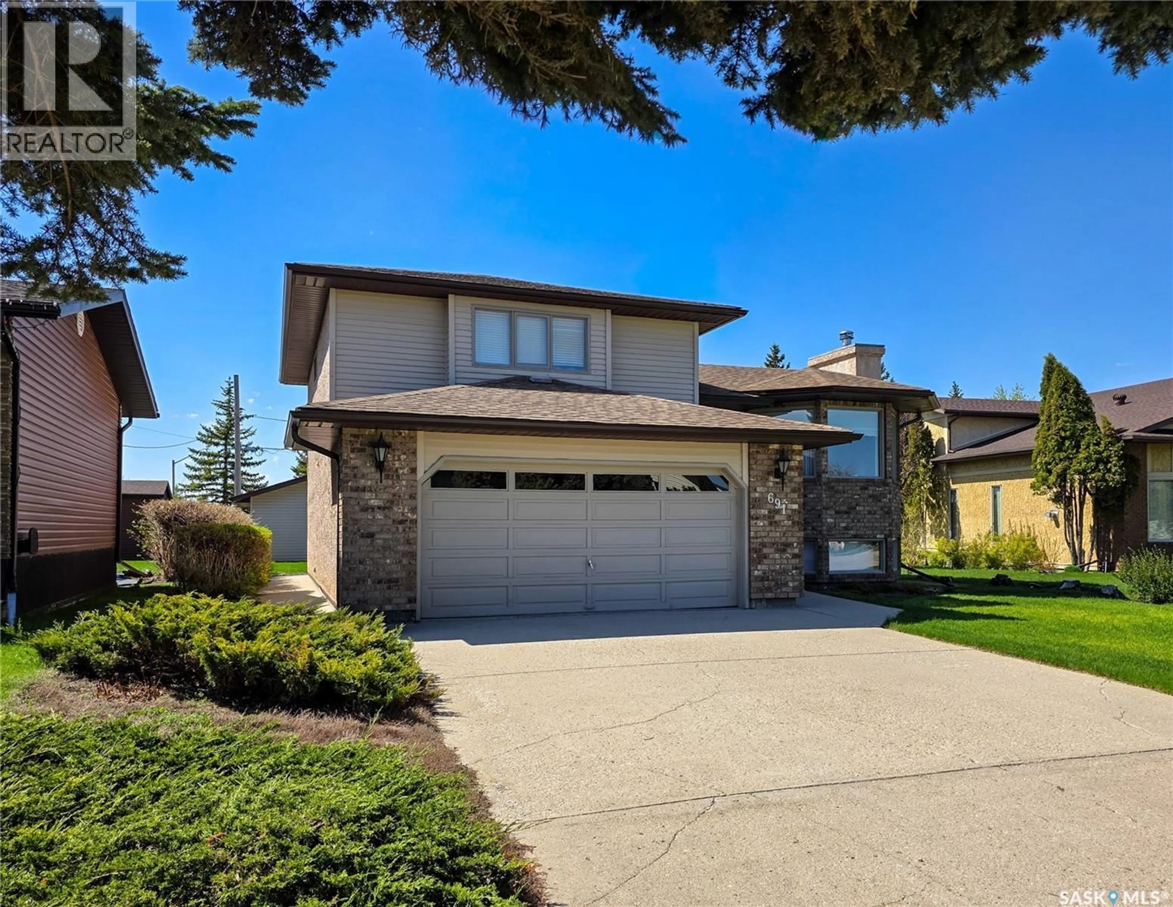 Home with brick exterior material, street for 691 10TH AVENUE, Melville Saskatchewan S0A2P0