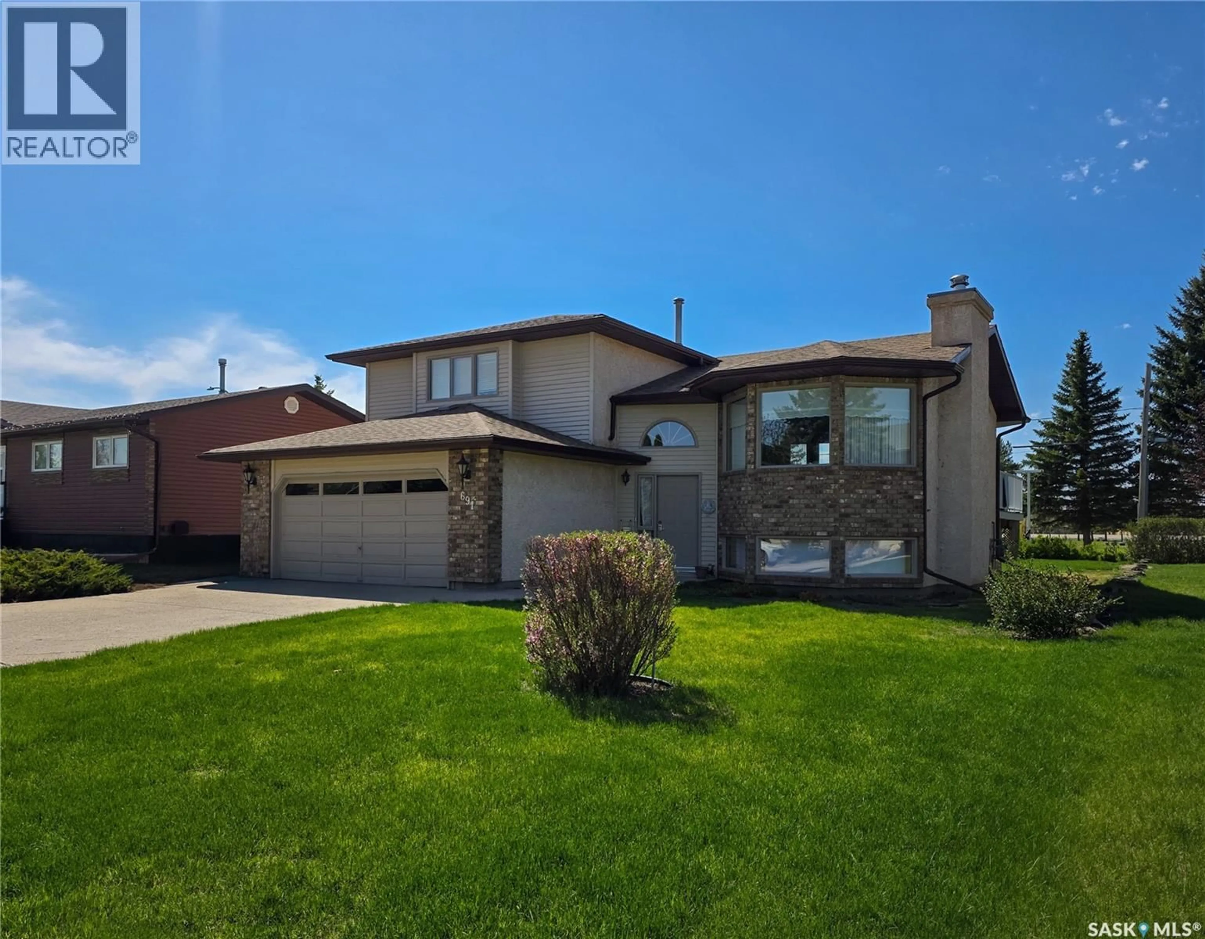 Home with brick exterior material, street for 691 10TH AVENUE, Melville Saskatchewan S0A2P0