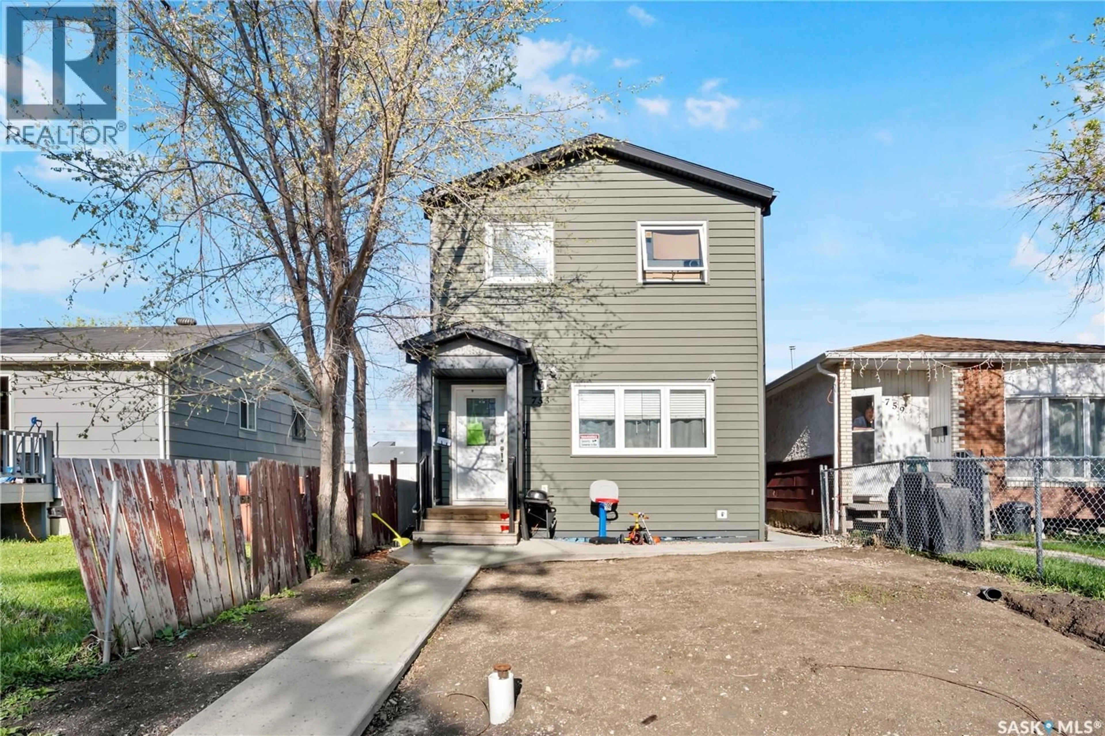 Home with vinyl exterior material, street for 753 RAE STREET, Regina Saskatchewan S4T2B1