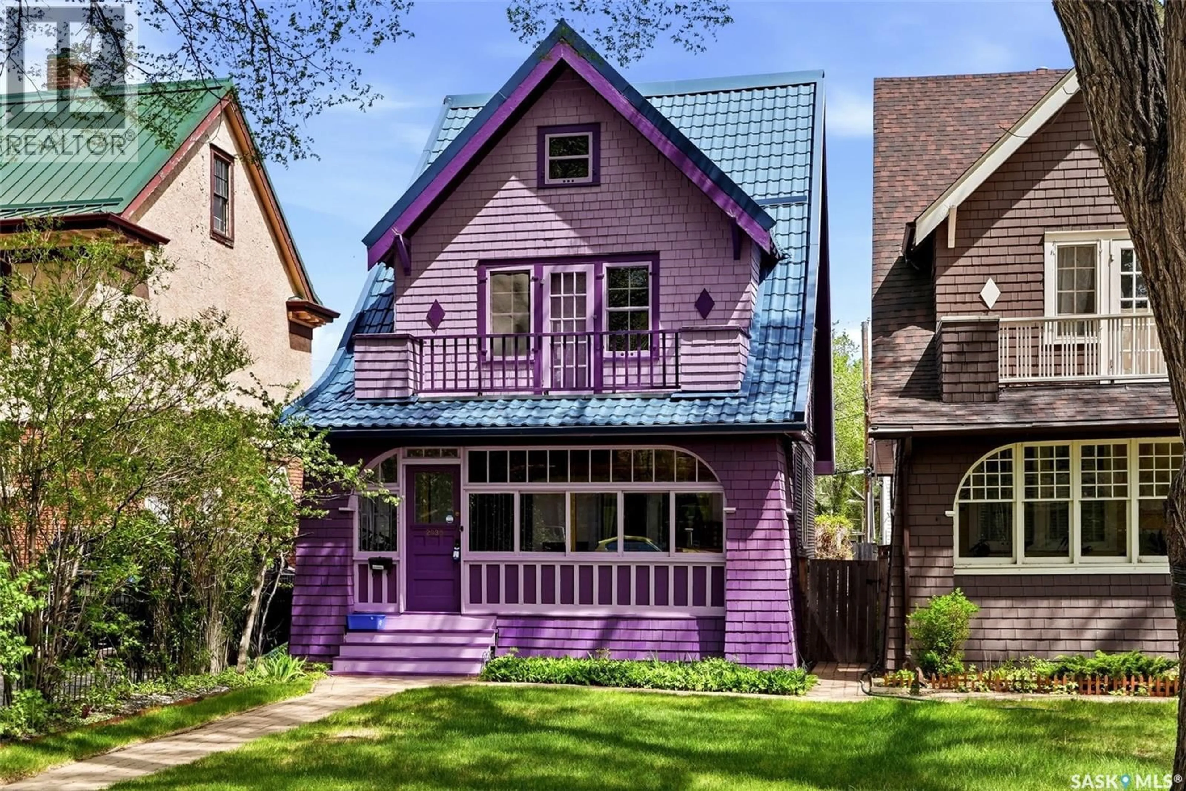 Home with vinyl exterior material, street for 2035 ROBINSON STREET, Regina Saskatchewan S4T2P6