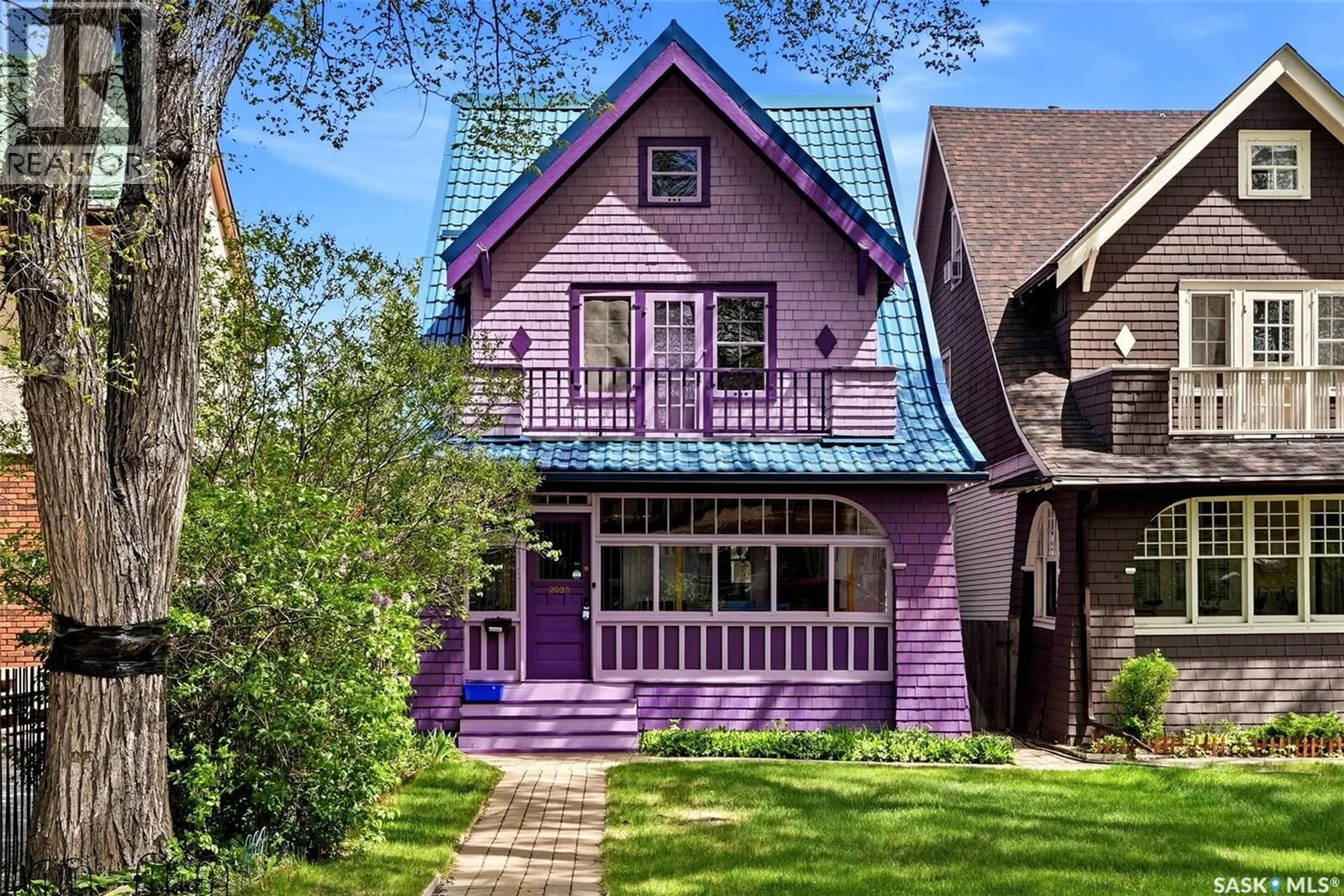 Home with vinyl exterior material, street for 2035 ROBINSON STREET, Regina Saskatchewan S4T2P6