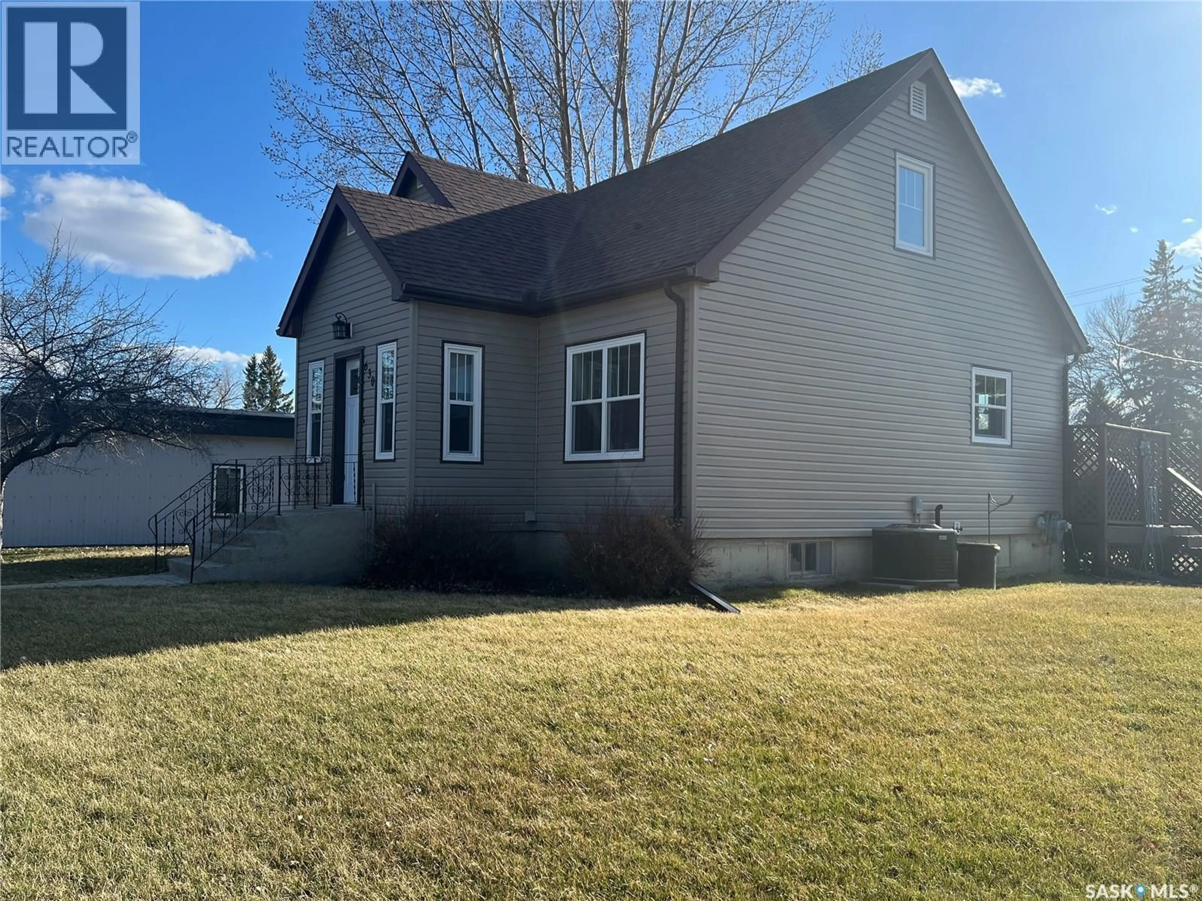 Home with vinyl exterior material, street for 630 MAIN STREET, Esterhazy Saskatchewan S0A0X0