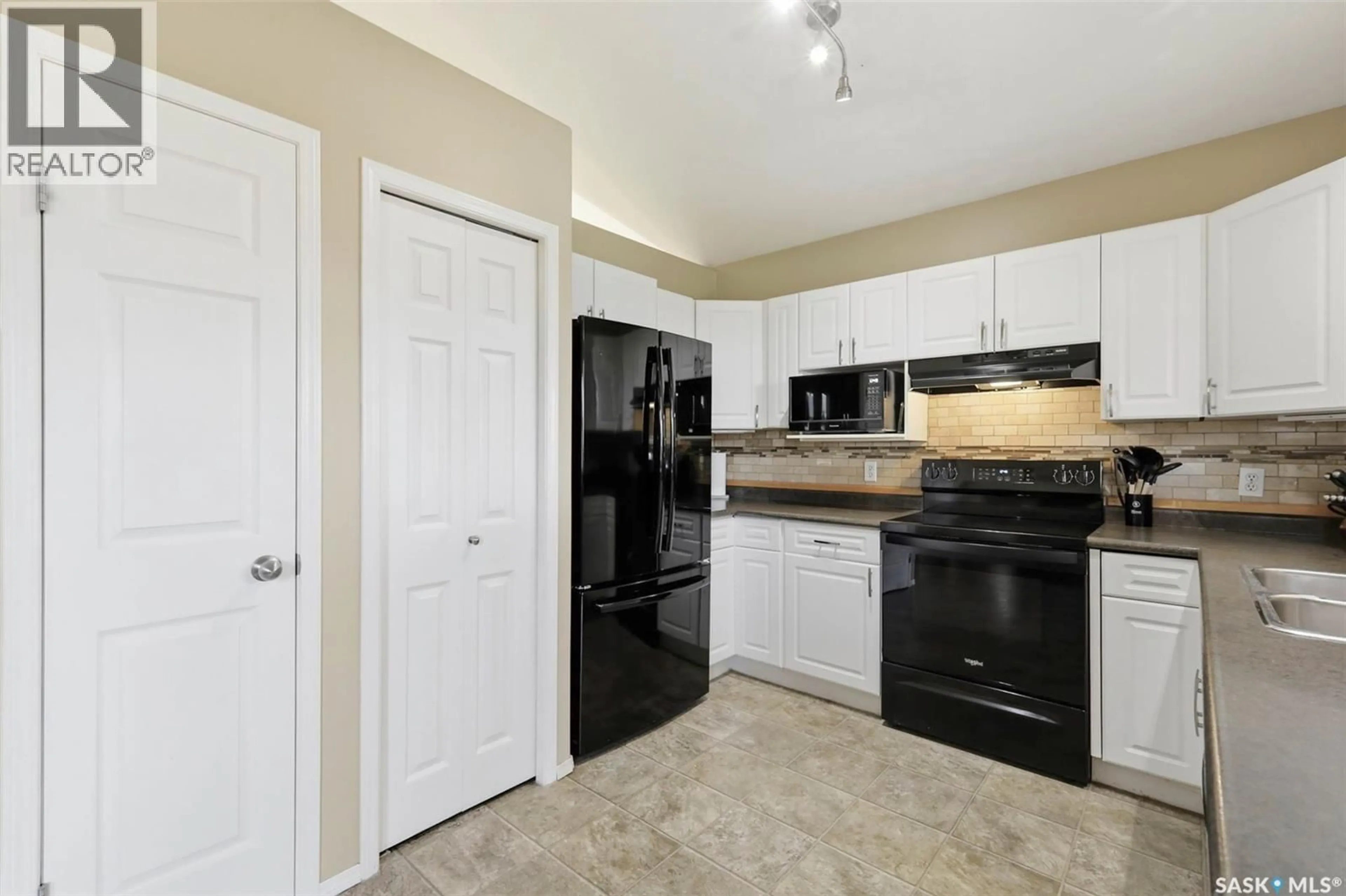 Standard kitchen, ceramic/tile floor for 201 1ST AVENUE, Warman Saskatchewan S0K4S0