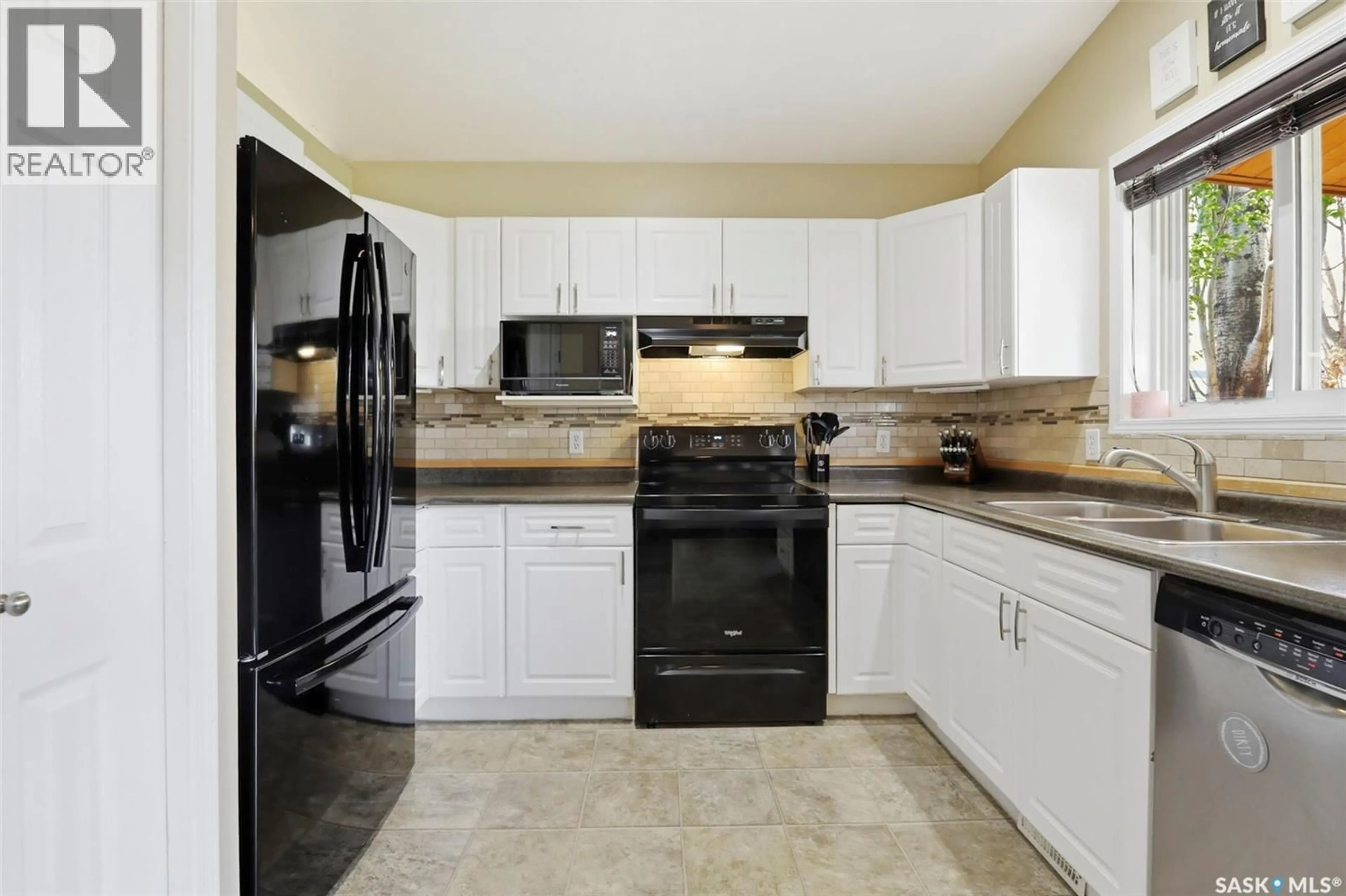 Standard kitchen, ceramic/tile floor for 201 1ST AVENUE, Warman Saskatchewan S0K4S0