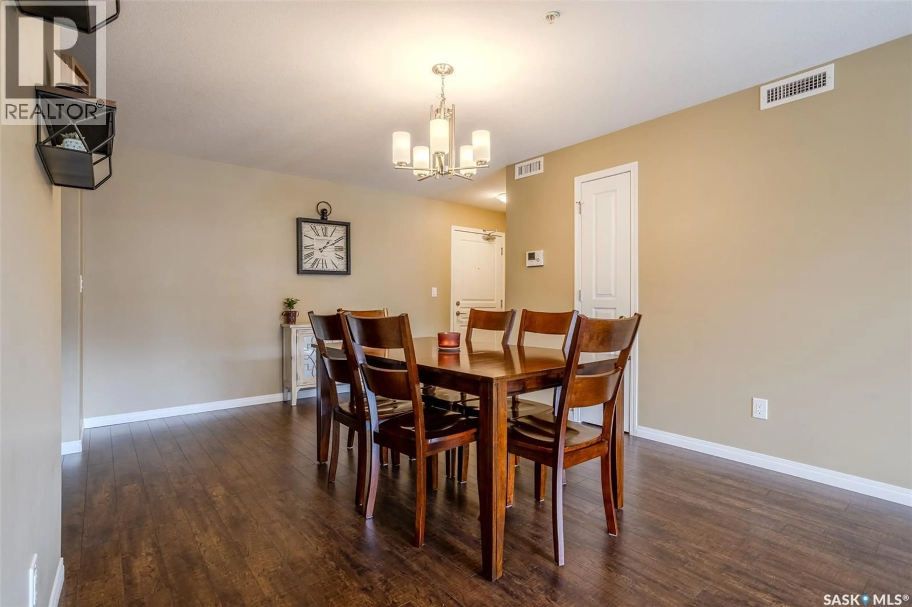 Dining room, wood/laminate floor for 110 - 5109 WILLIS CRESCENT, Saskatoon Saskatchewan S7T0N5