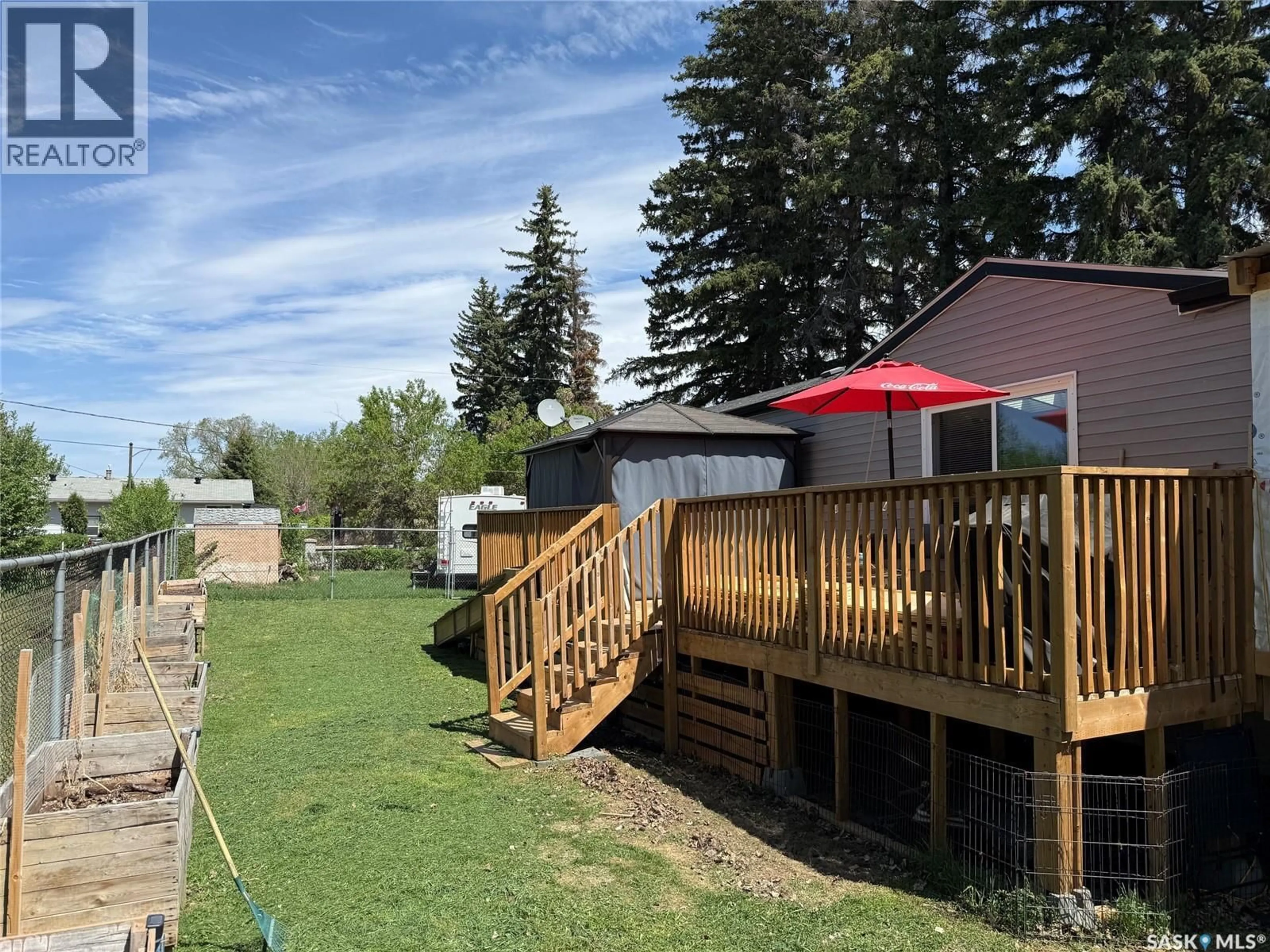 A pic from outside/outdoor area/front of a property/back of a property/a pic from drone, mountain view for 235 1ST AVENUE, Bradwell Saskatchewan S0K0P0