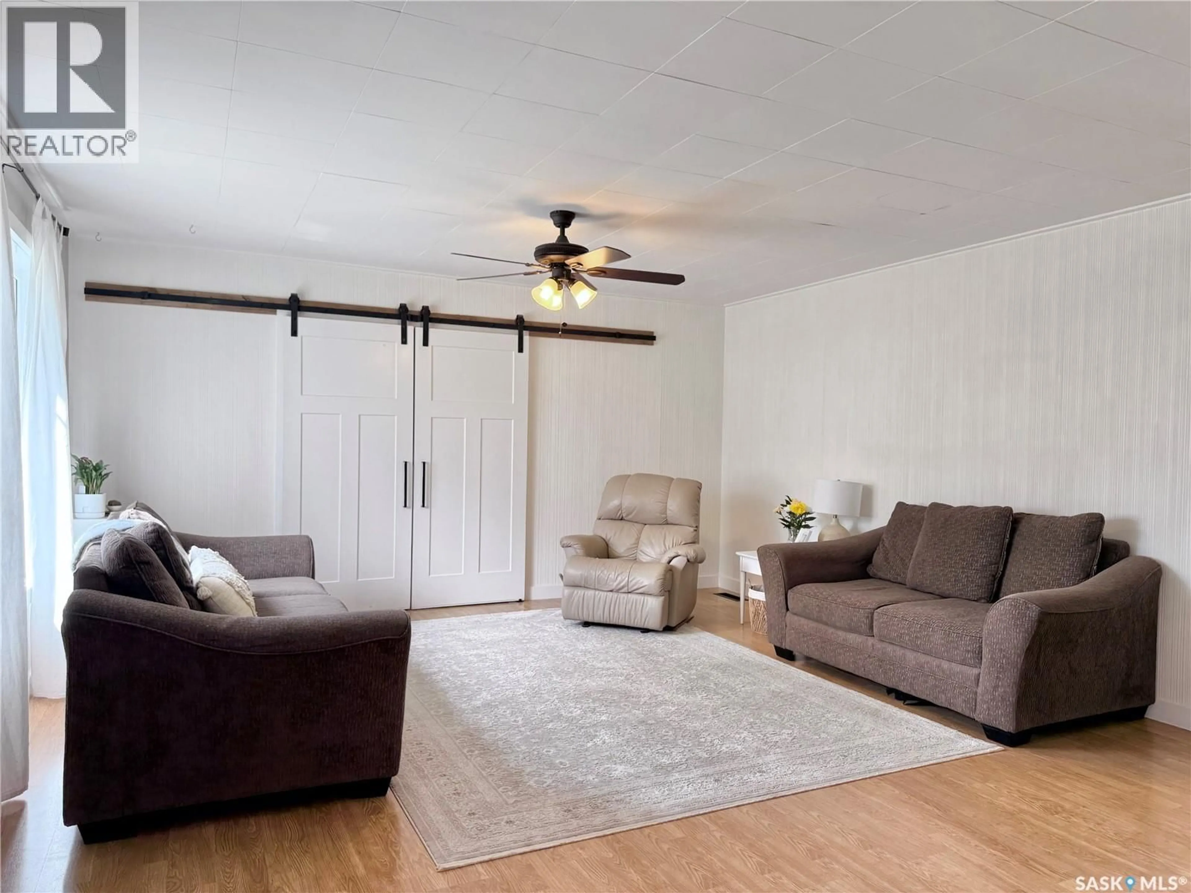Living room with furniture, unknown for 211 PANGMAN STREET, Outlook Saskatchewan S0L2N0