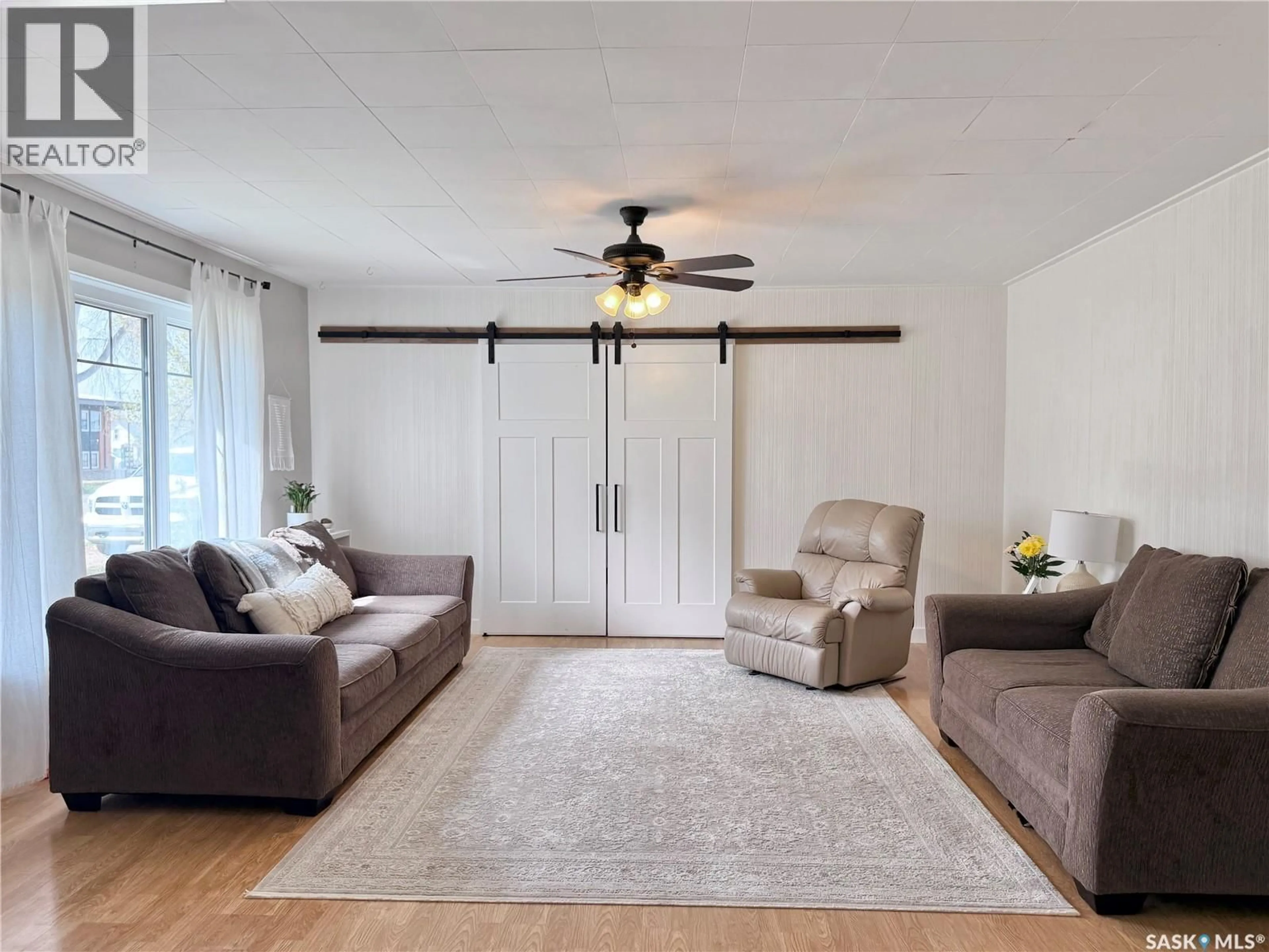 Living room with furniture, unknown for 211 PANGMAN STREET, Outlook Saskatchewan S0L2N0