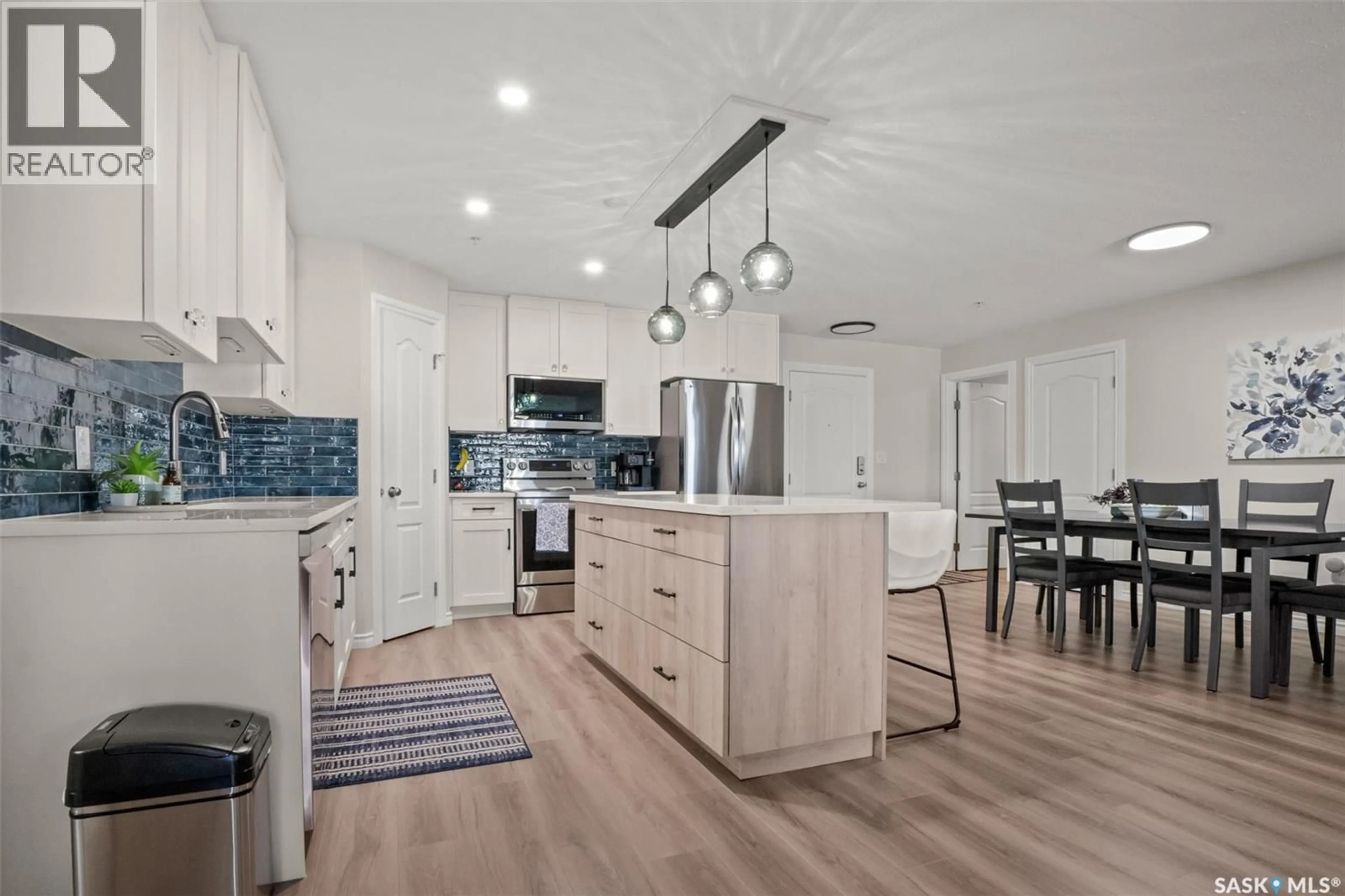 Open concept kitchen, unknown for 100 - 105 1ST AVENUE, Warman Saskatchewan S0K0A1