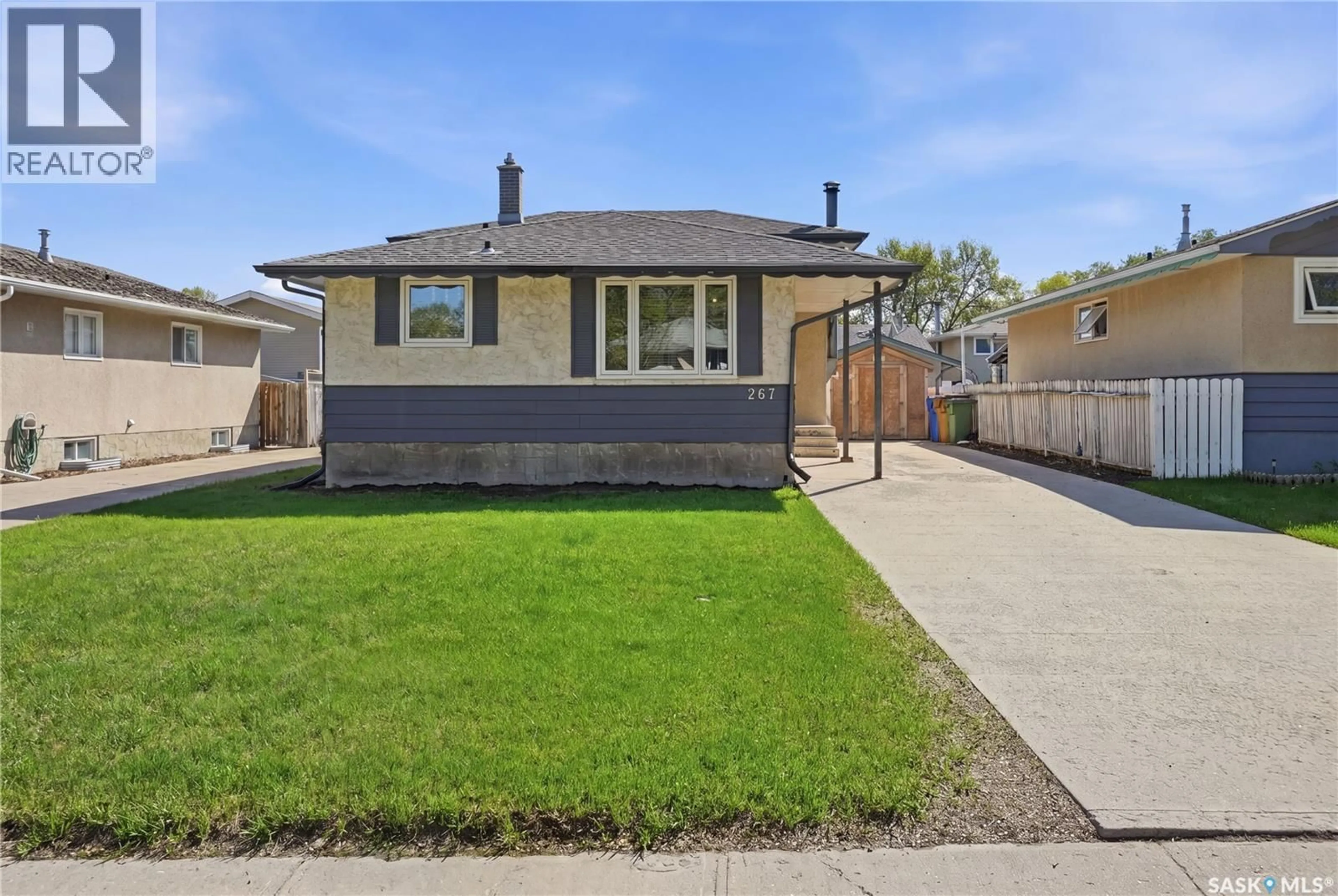 Home with vinyl exterior material, street for 267 UPLAND DRIVE, Regina Saskatchewan S4R5H5