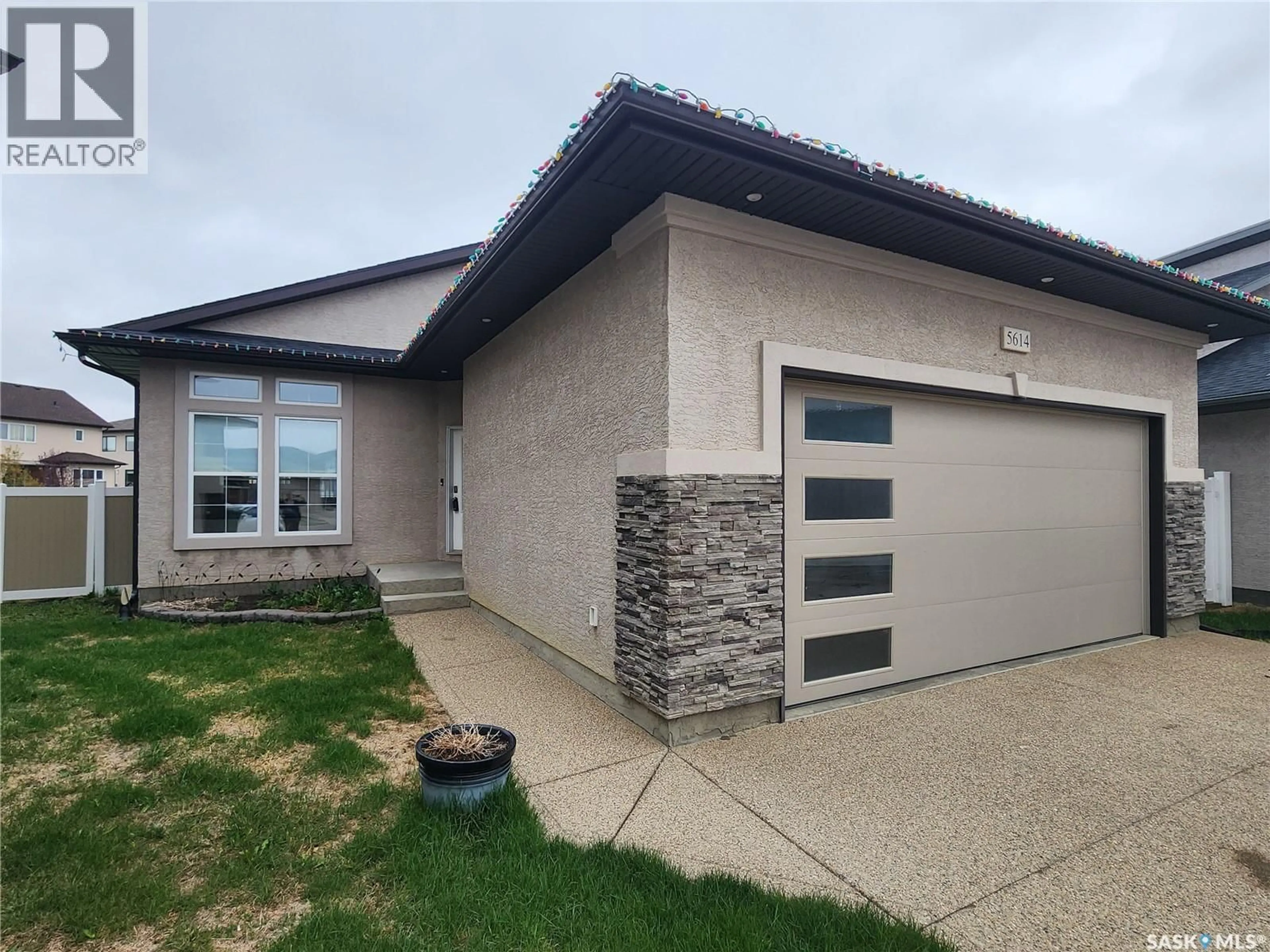 Home with brick exterior material, unknown for 5614 BEACON PLACE, Regina Saskatchewan S4W0J7
