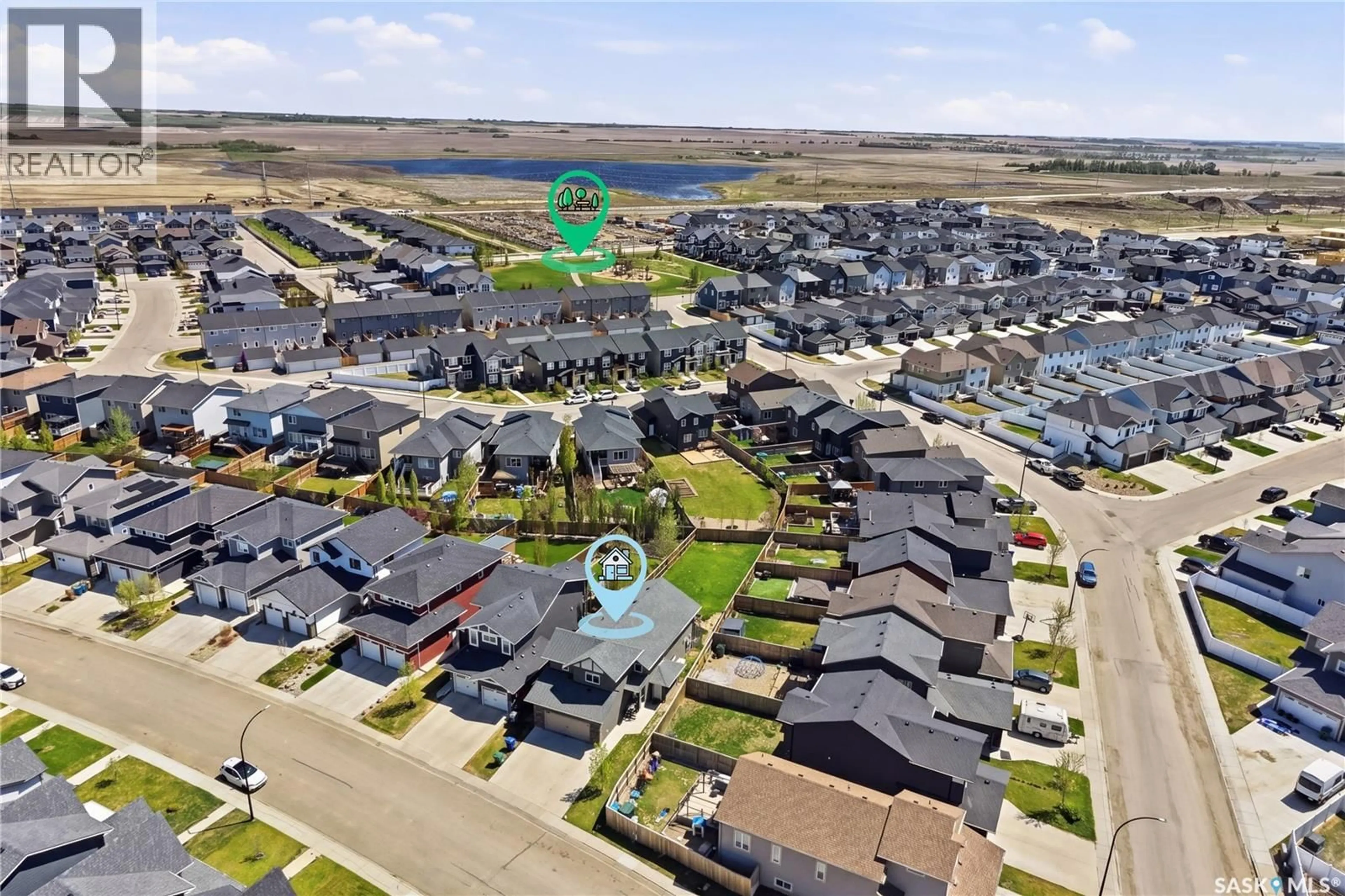 A pic from outside/outdoor area/front of a property/back of a property/a pic from drone, water/lake/river/ocean view for 270 NEWTON LINK, Saskatoon Saskatchewan S7V0M8